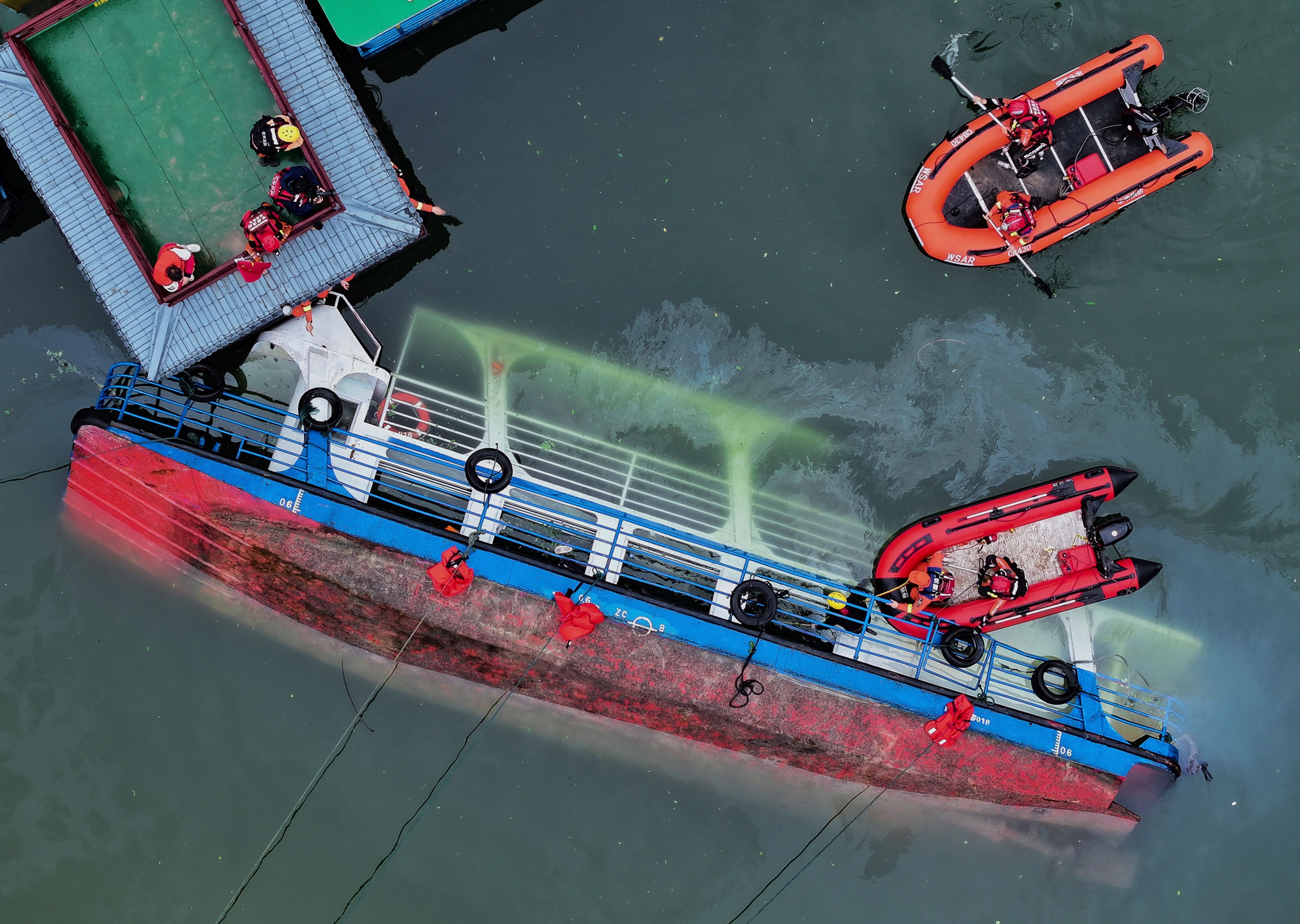 Tourist boats capsize in sudden storm in southwest China, leaving 10 dead