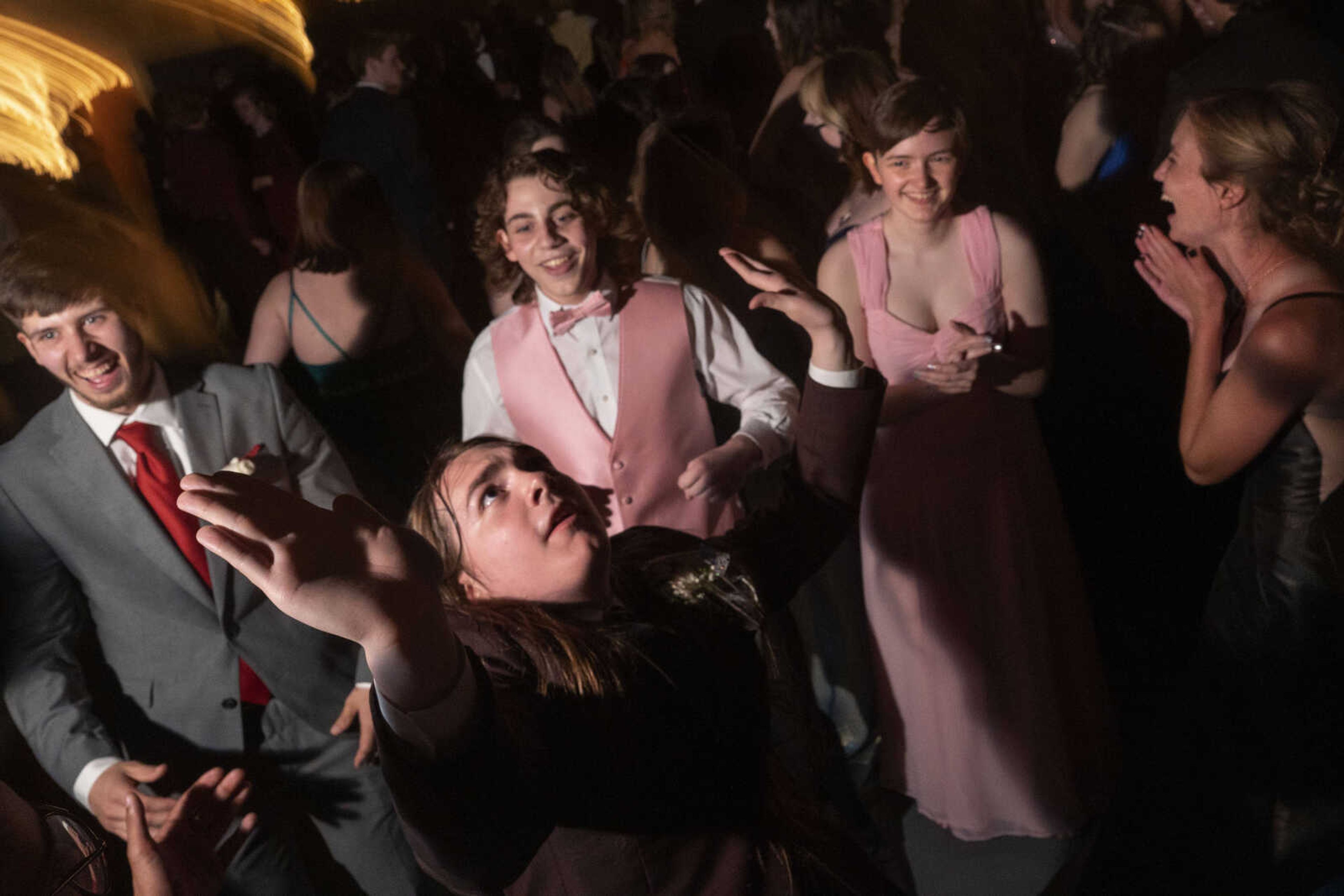 Arden Coots, center, dances what he calls "the Ardena" as other students look on during prom Saturday, May 1, 2021 at Jackson High School.