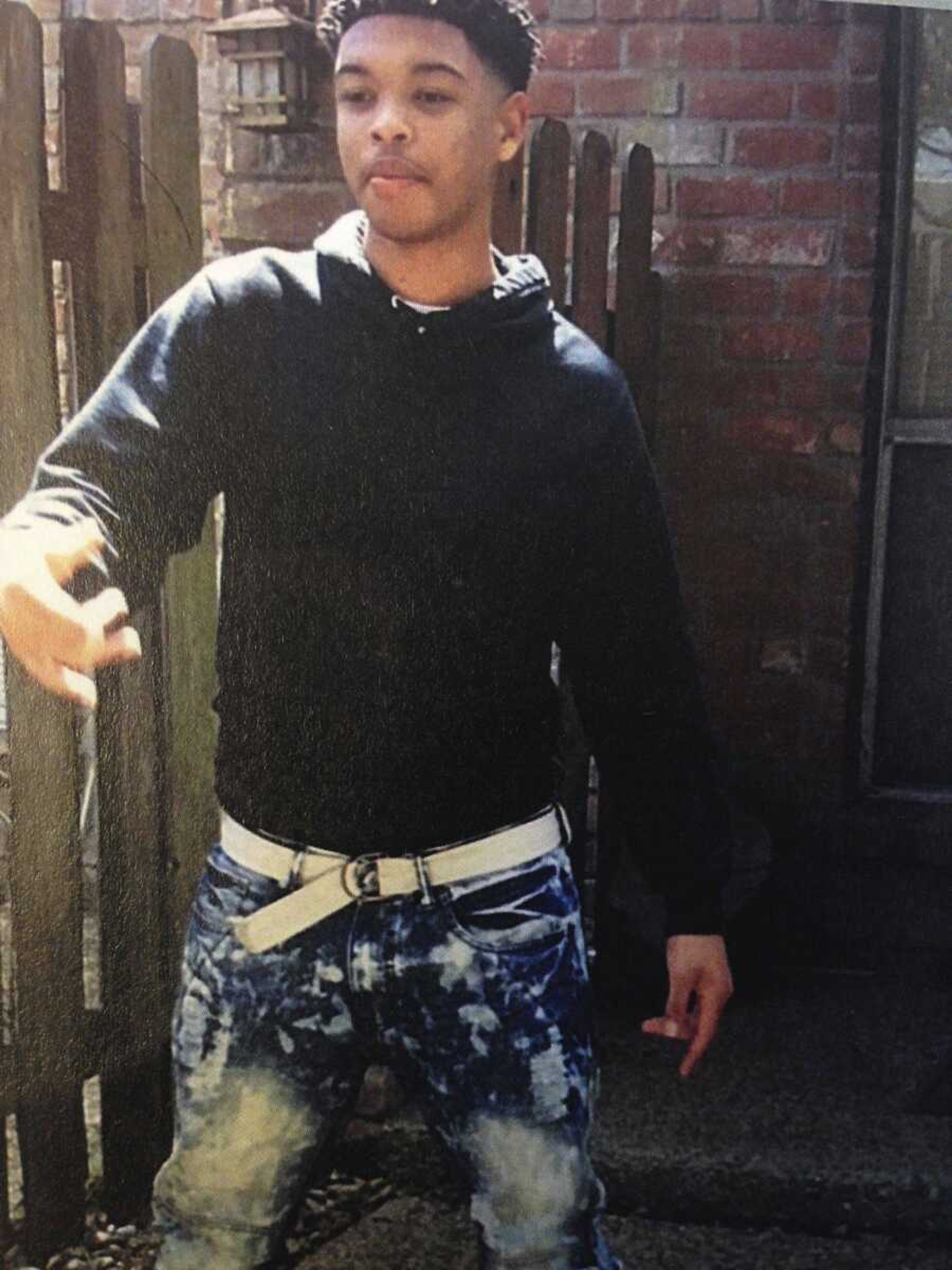 Jaquin Thomas, 14, poses for a photo in the yard of a family friend in 2014 in New Orleans. Thomas was arrested in July 2016, at age 15, and accused of murder and eventually sent to the New Orleans jail to await trial. He killed himself Oct. 17, 2016.