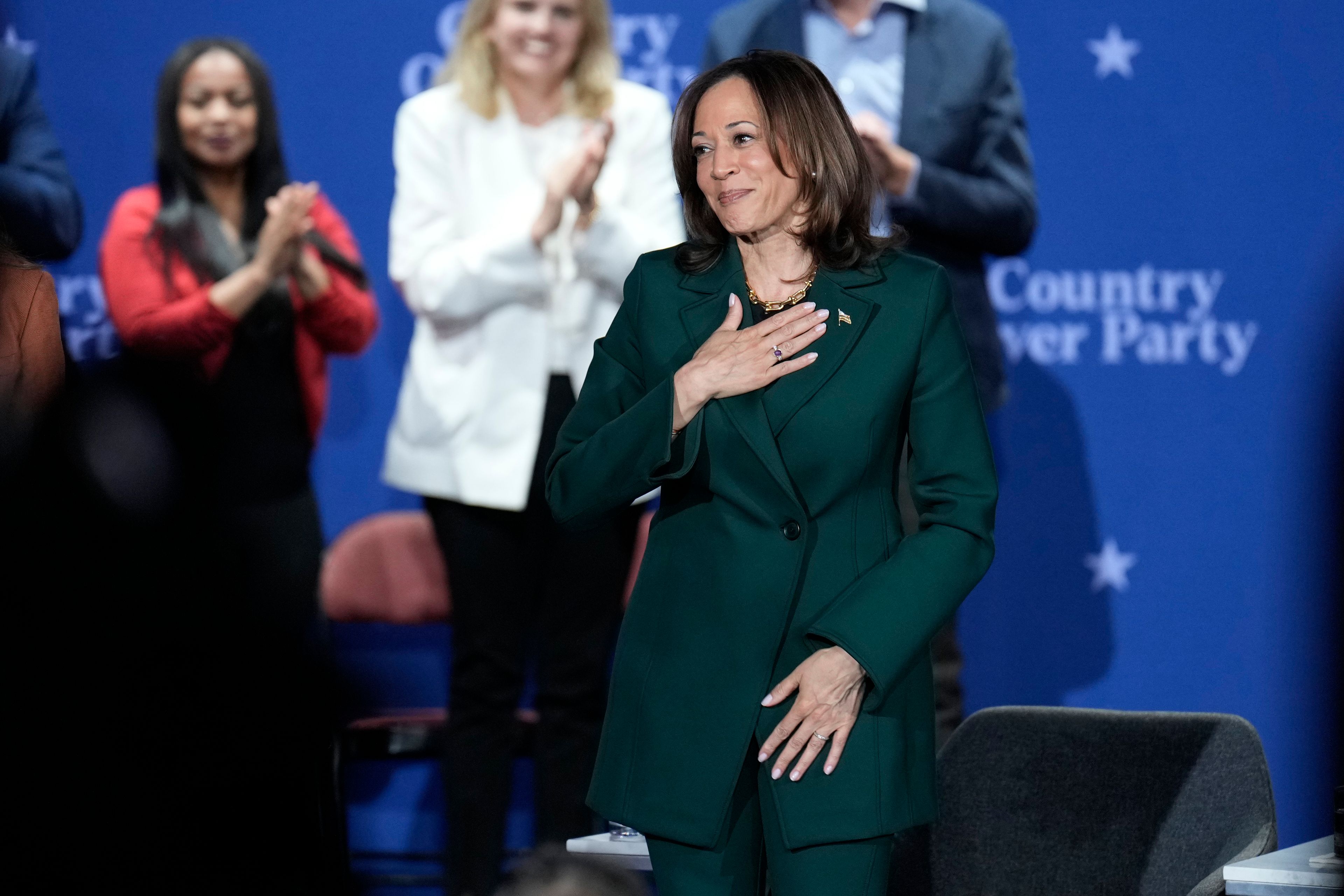 Democratic presidential nominee Vice President Kamala Harris gestures at the conclusion of a town hall at the Royal Oak Theatre in Royal Oak, Mich., Monday, Oct. 21, 2024. (AP Photo/Jacquelyn Martin)