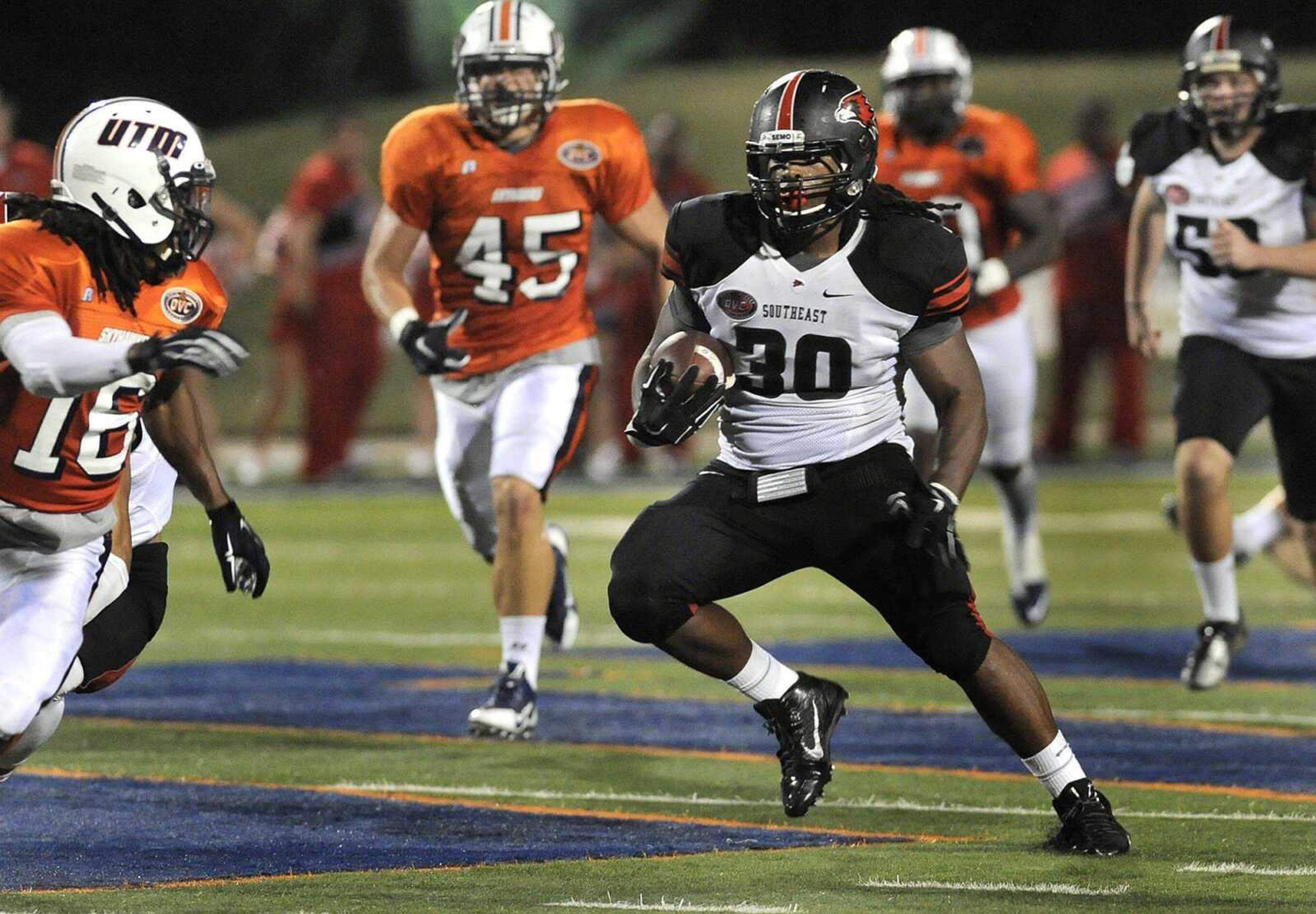 Southeast Missouri State's Ron Coleman rushes 26 yards after a fake punt against UT Martin during the third quarter Saturday, Sept. 27, 2014 in Martin, Tenn. (Fred Lynch)