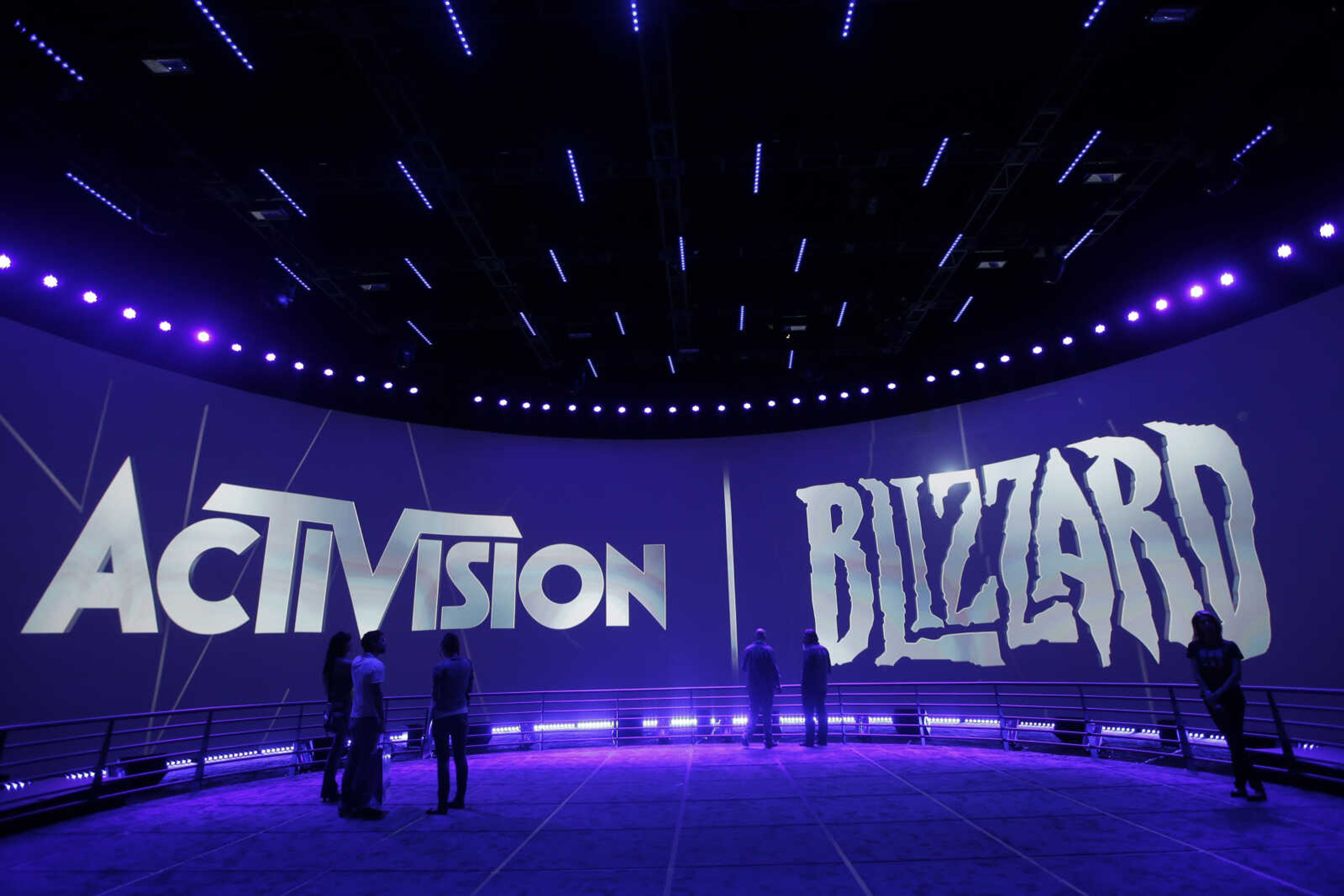 The Activision Blizzard Booth is shown June 13, 2013, during the Electronic Entertainment Expo in Los Angeles. The European Union on Monday approved Microsoft's $69 billion purchase of video game maker Activision Blizzard, deciding the deal won't stifle competition for popular console titles such as Call of Duty, and accepting the U.S. tech company's remedies to boost competition in cloud gaming.