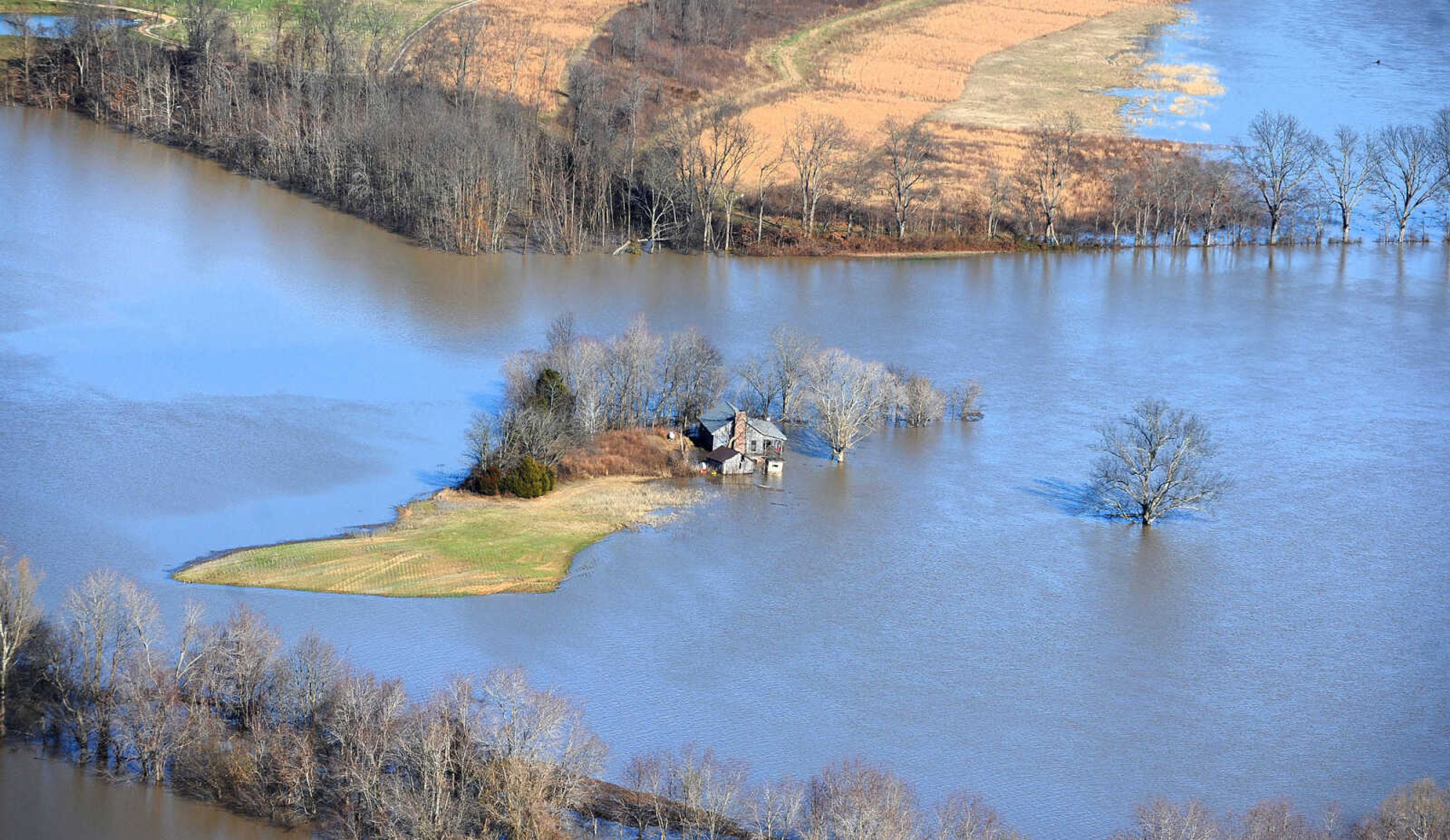 LAURA SIMON ~ lsimon@semissourian.com

Floodwater from the swollen Mississippi River is seen in north Cape Girardeau County, Saturday, Jan. 2, 2016.