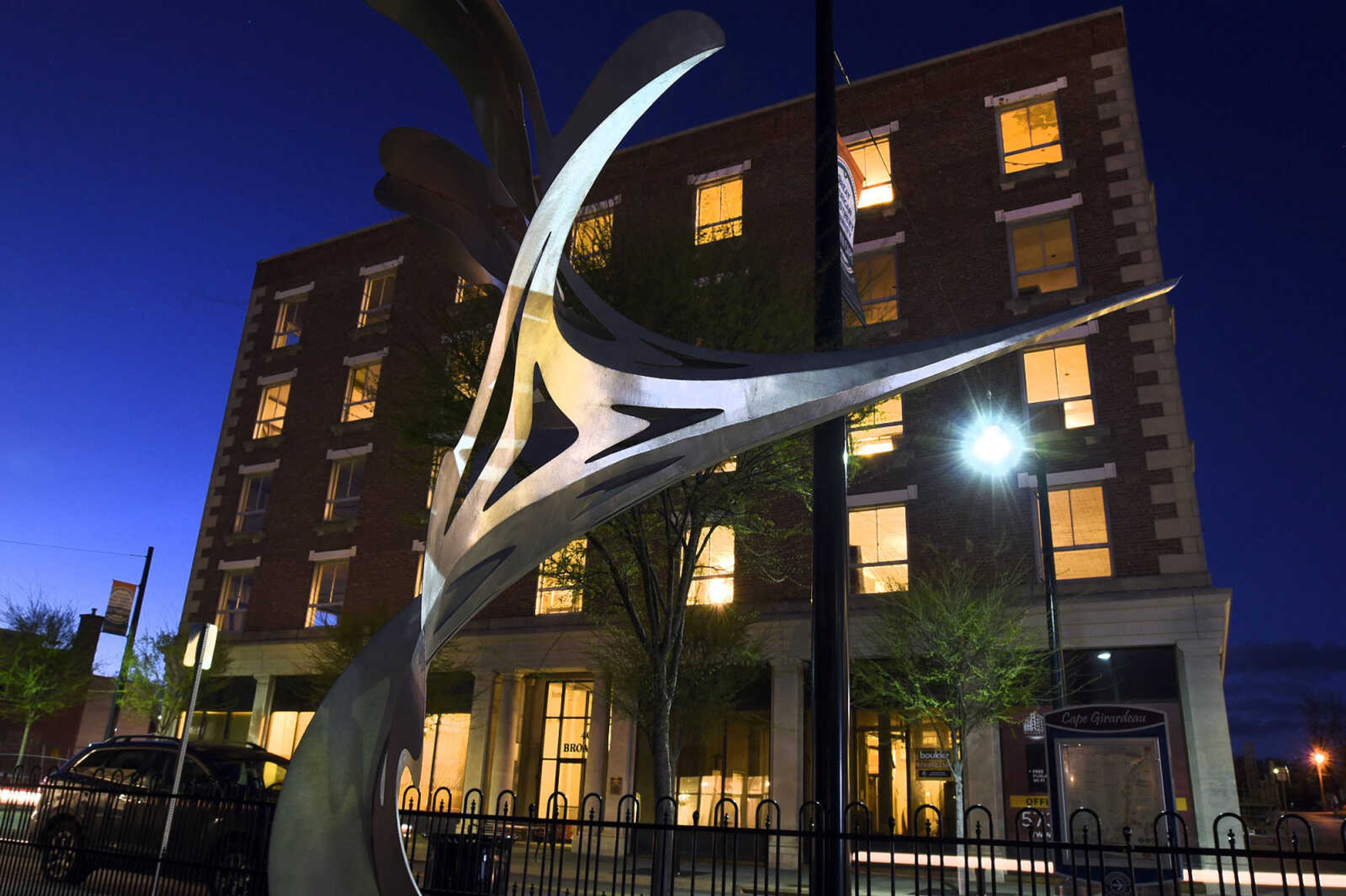 Tommy Riefe's sculpture "Portal" is seen on the corner of Broadway and Fountain Street on Thursday evening, April 6, 2017, in Cape Girardeau.