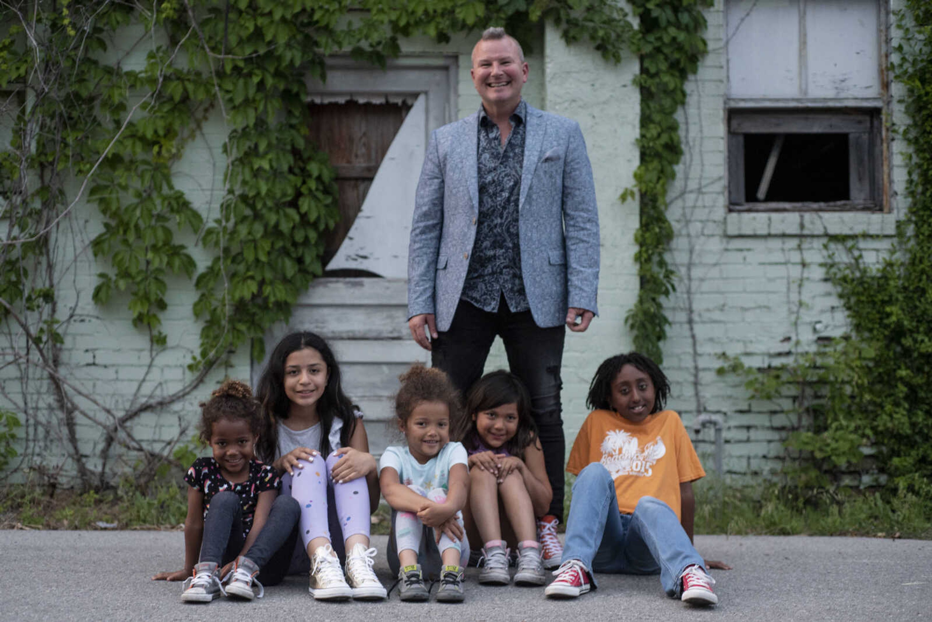 Dr. Eric Becking poses for a photo with his daughters, from left, Lennie, 4, Bianca, 12, Dolly, 5, Arianna, 7, and Solie, 10, Monday, June 3, 2019, in Cape Girardeau.