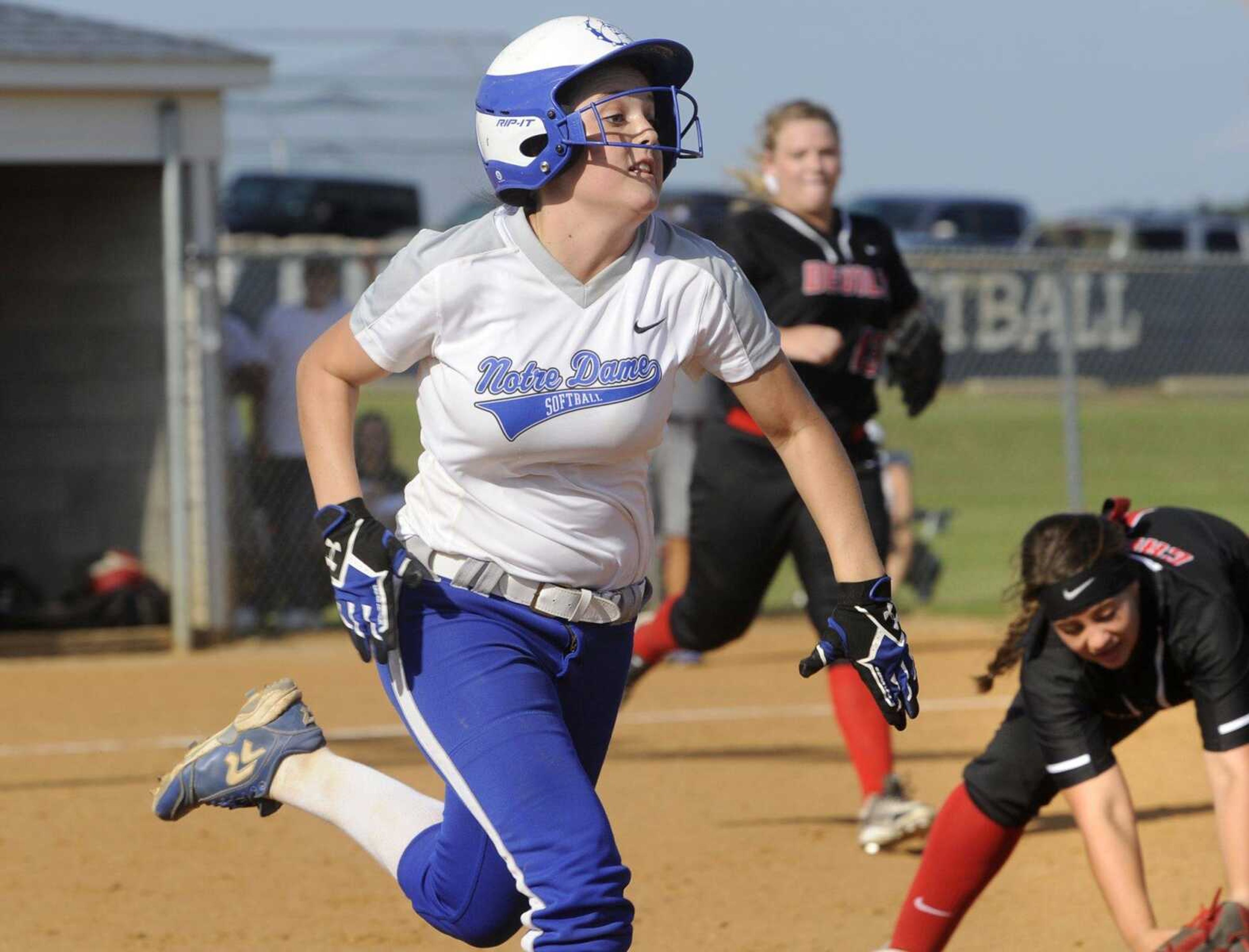 Notre Dame's Morgan Duschell beats out a bunt against Chaffee to reach first base during the first inning Wednesday, Aug. 24, 2016 at Notre Dame Regional High School.