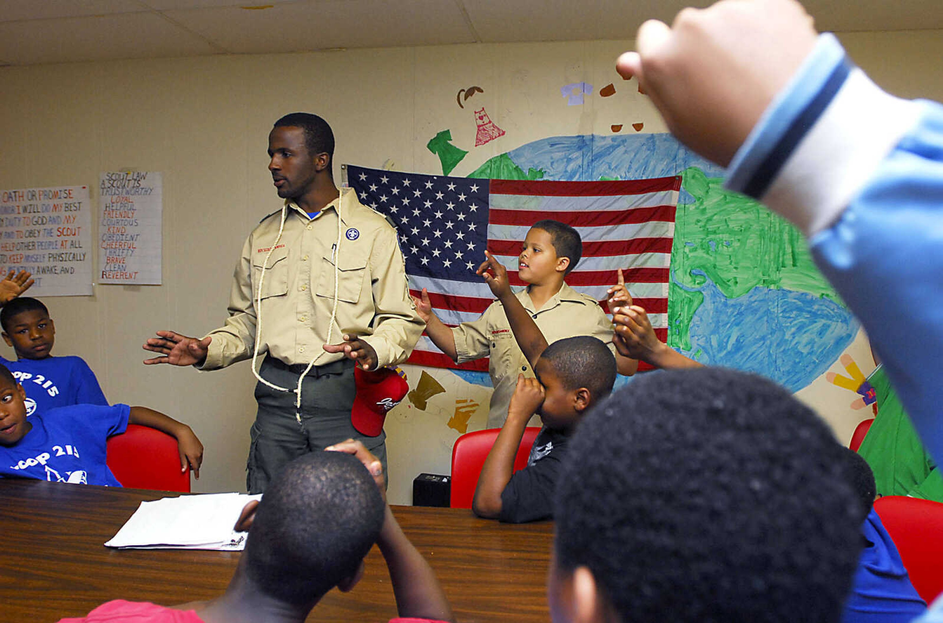 Scout Master Giles Triplett talks with Troop 215 about an upcoming camping trip to Trail of Tears State Park during a meeting Tuesday evening, May 5, 2009, at the Cape Area Family Resource Center.  The new troop started meeting earlier this year.