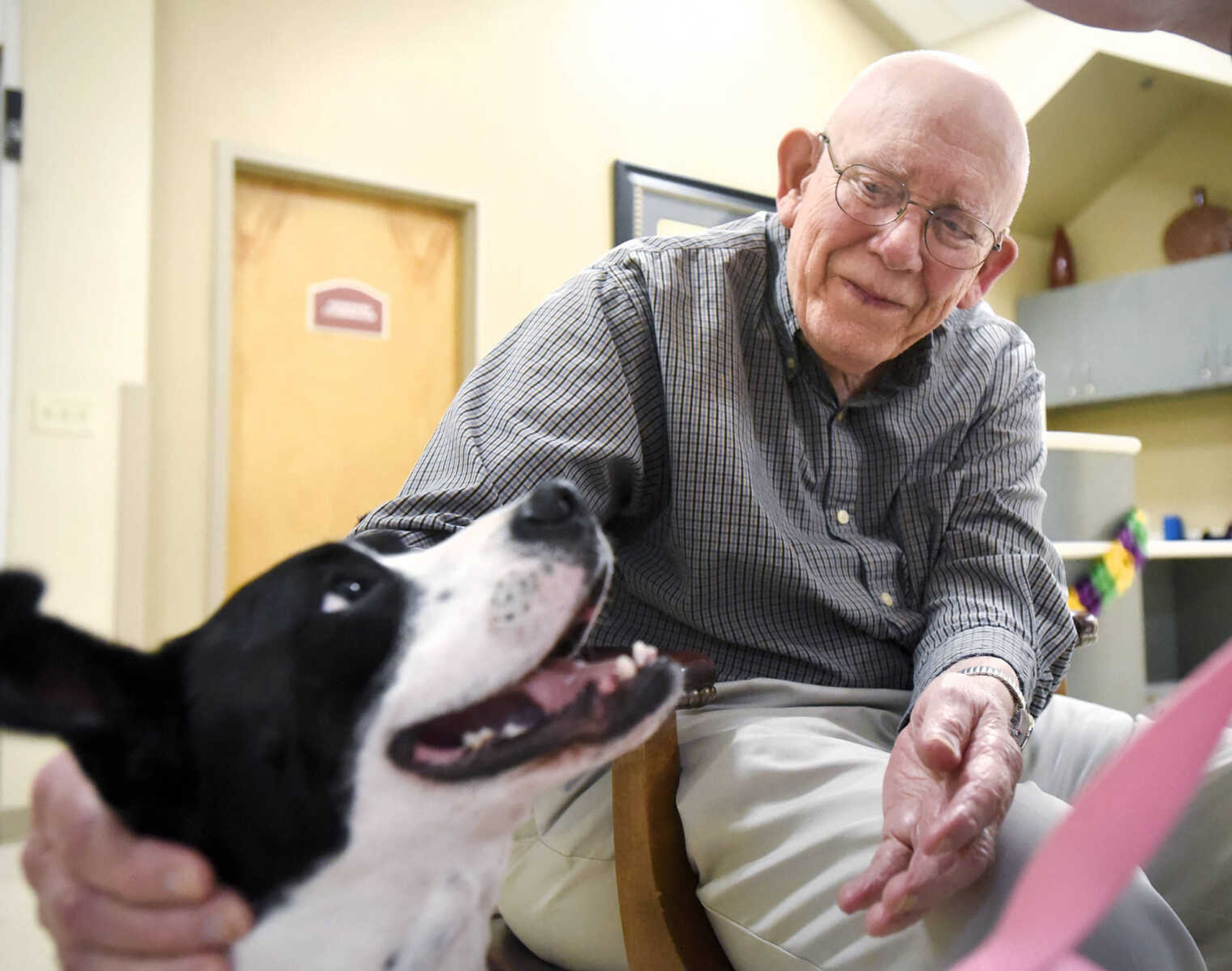 Ron Shannon visits with Lovey on Tuesday, Feb. 21, 2017, during the Pet Pals stop at the Missouri Veteran's Home in Cape Girardeau.