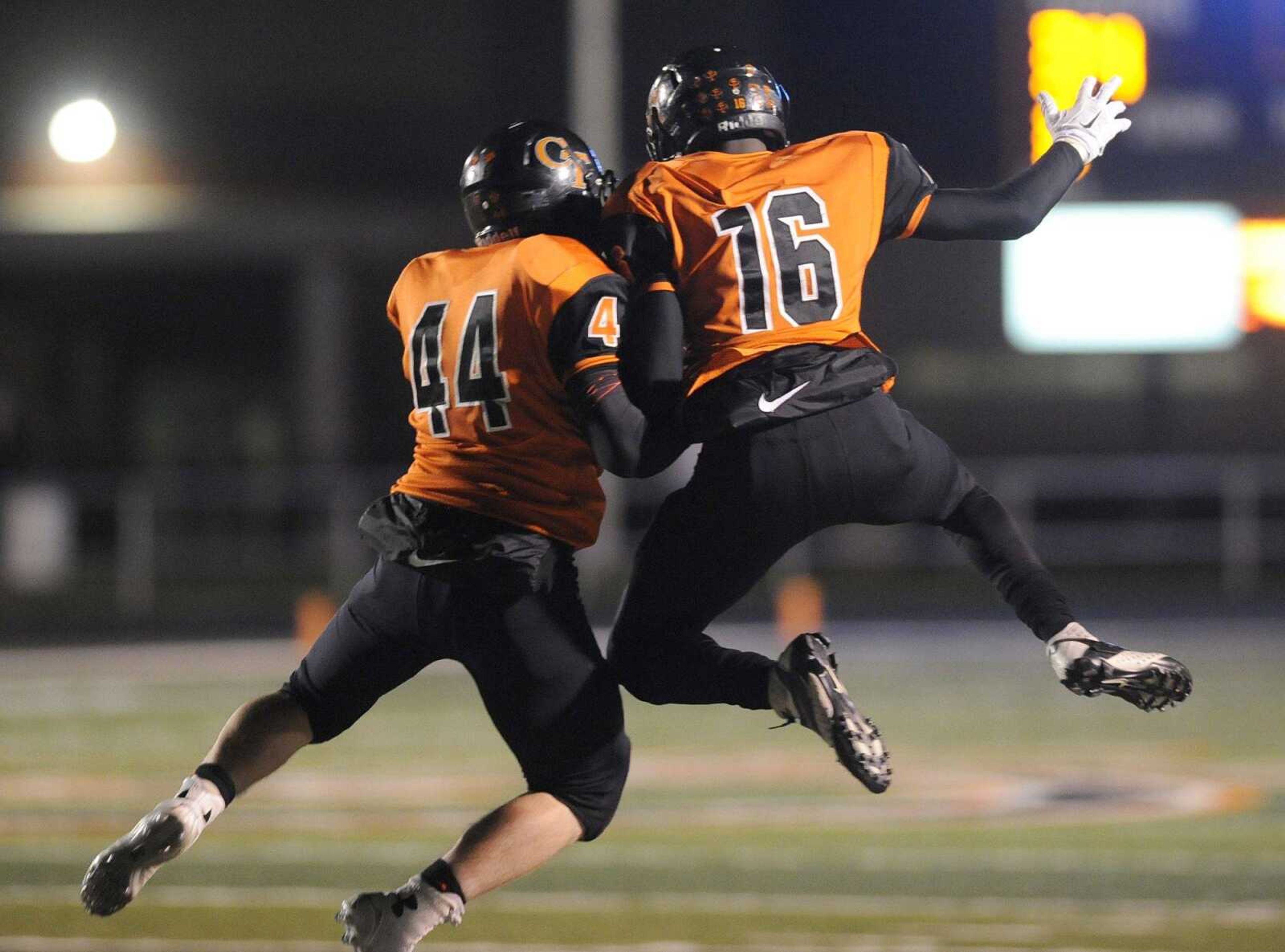 Central's Joshua Jones, left, celebrates with Jordan Franklin after Central scored on a two-point conversion after a touchdown against Hillsboro in the Class 4 District 1 championship Friday, Nov. 7, 2014 at Central. (Glenn Landberg)