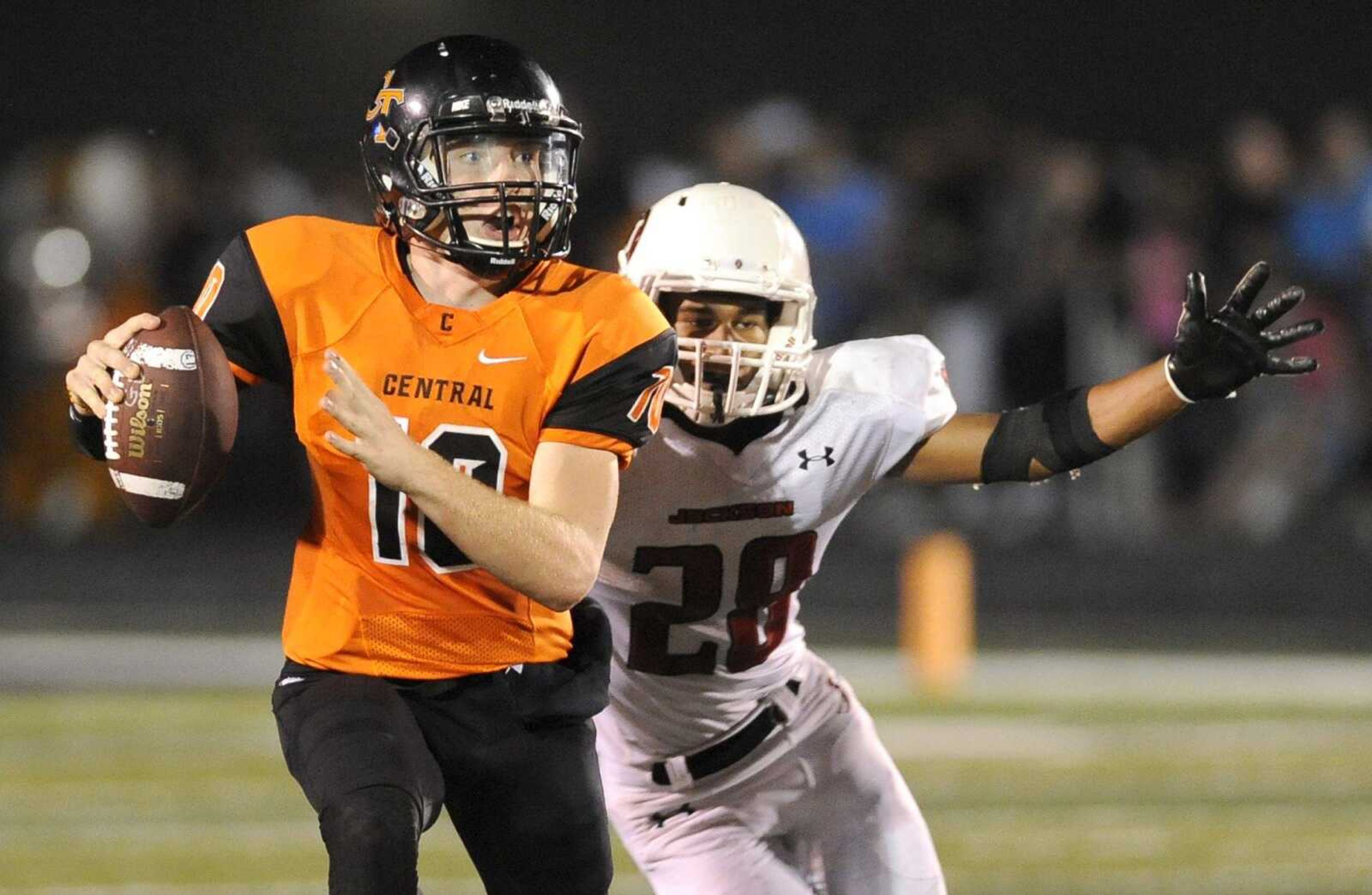 Central's Peyton Montgomery outruns Jackson s Ethan Isakson in the first quarter Friday, Sept. 26, 2014 at Cape Central. (Glenn Landberg)