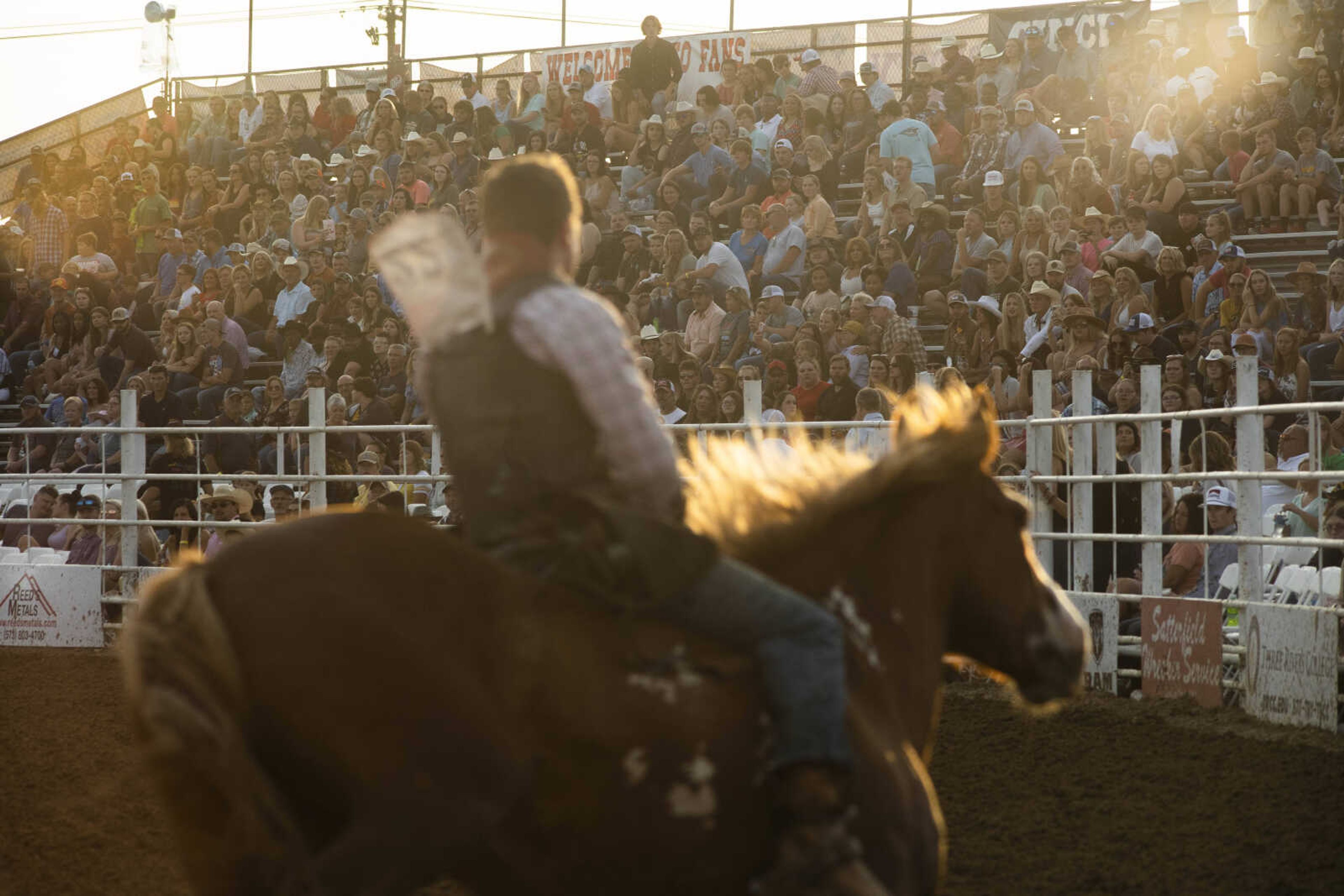 A rider performs during the last night of the Sikeston Jaycee Bootheel Rodeo Saturday, Aug. 14, 2021,&nbsp;in Sikeston, Missouri.