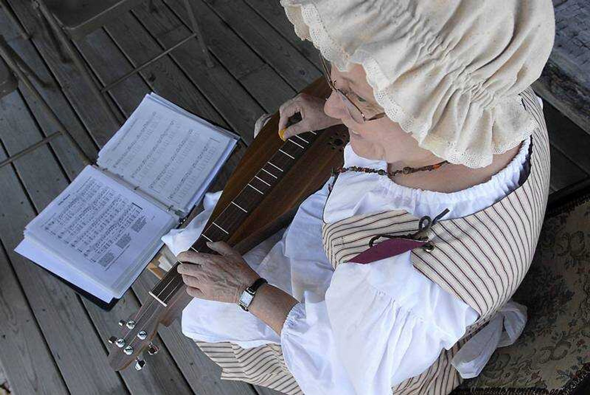 KIT DOYLE ~ kdoyle@semissourian.com
Rosemary Oxley played the dulcimer for entertainment Wednesday morning at the Red House Interpretive Center for a celebration marking Cape Girardeau's 200th year as an incorporated city.