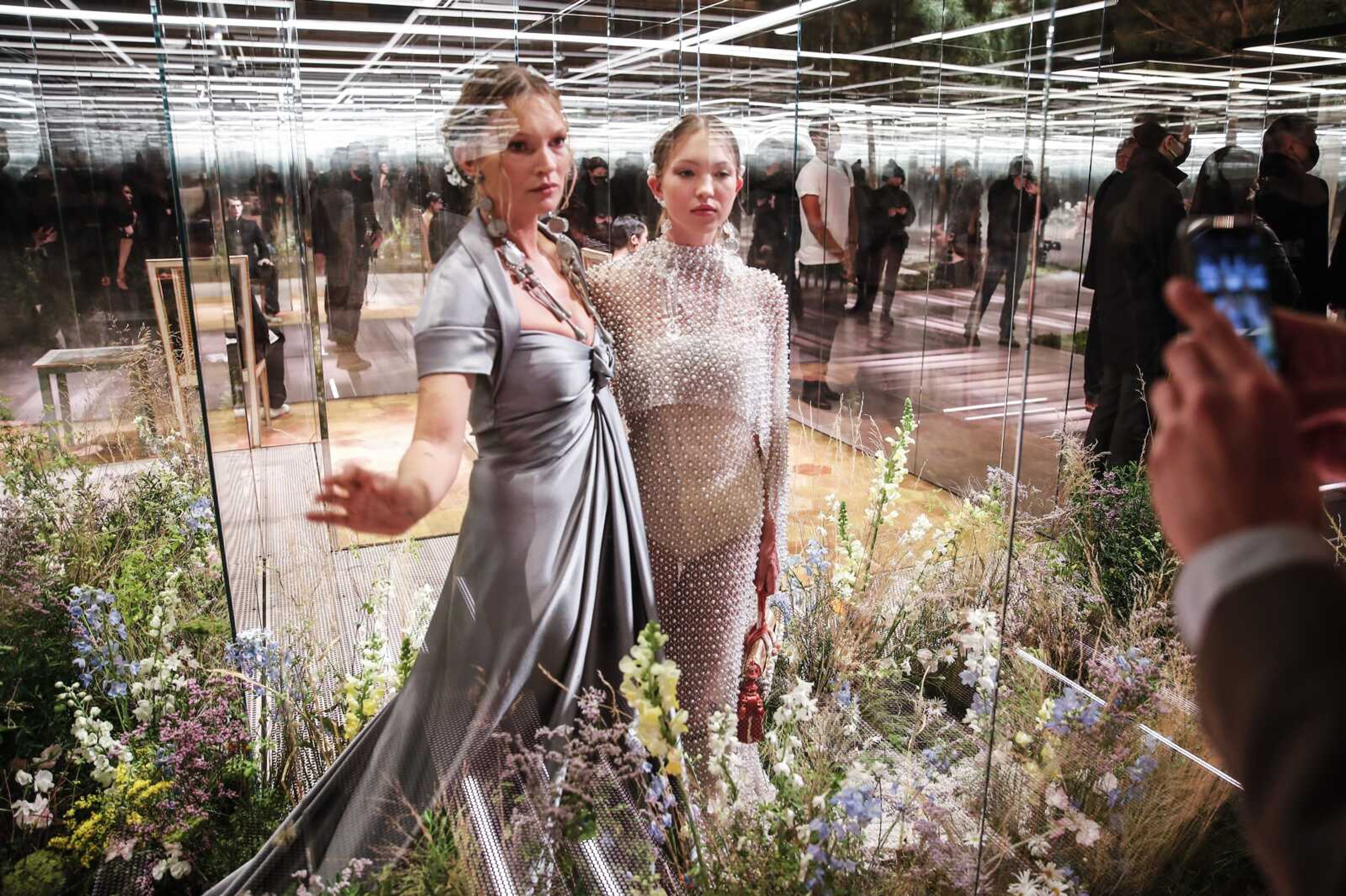 Model Kate Moss, left, and her daughter Lila Grace Moss wear a creation for Fendi's Spring-Summer 2021 Haute Couture fashion collection presented Jan. 27 in Paris.