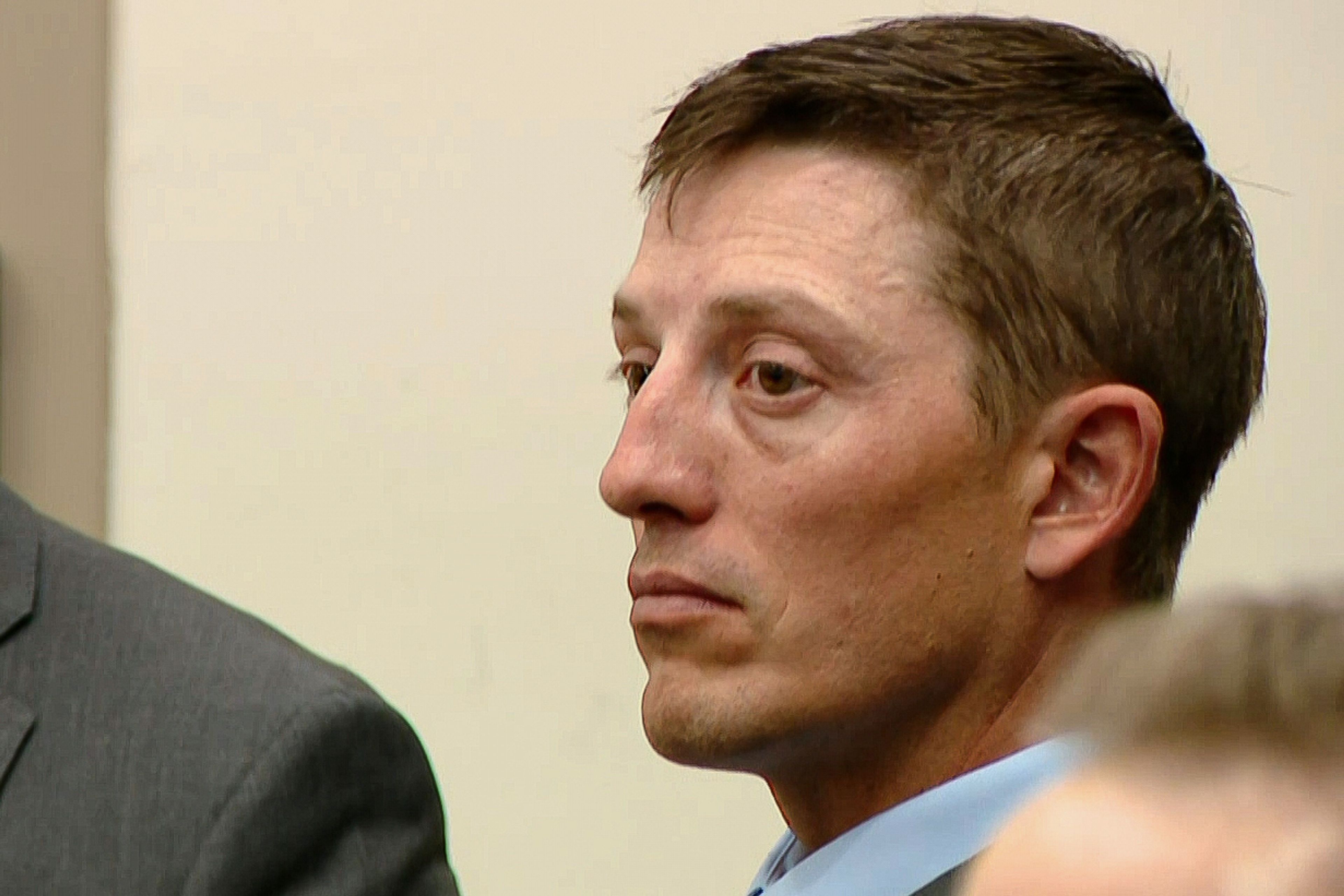 Trial of Michigan police officer charged in fatal shooting of Congolese immigrant ends in hung jury