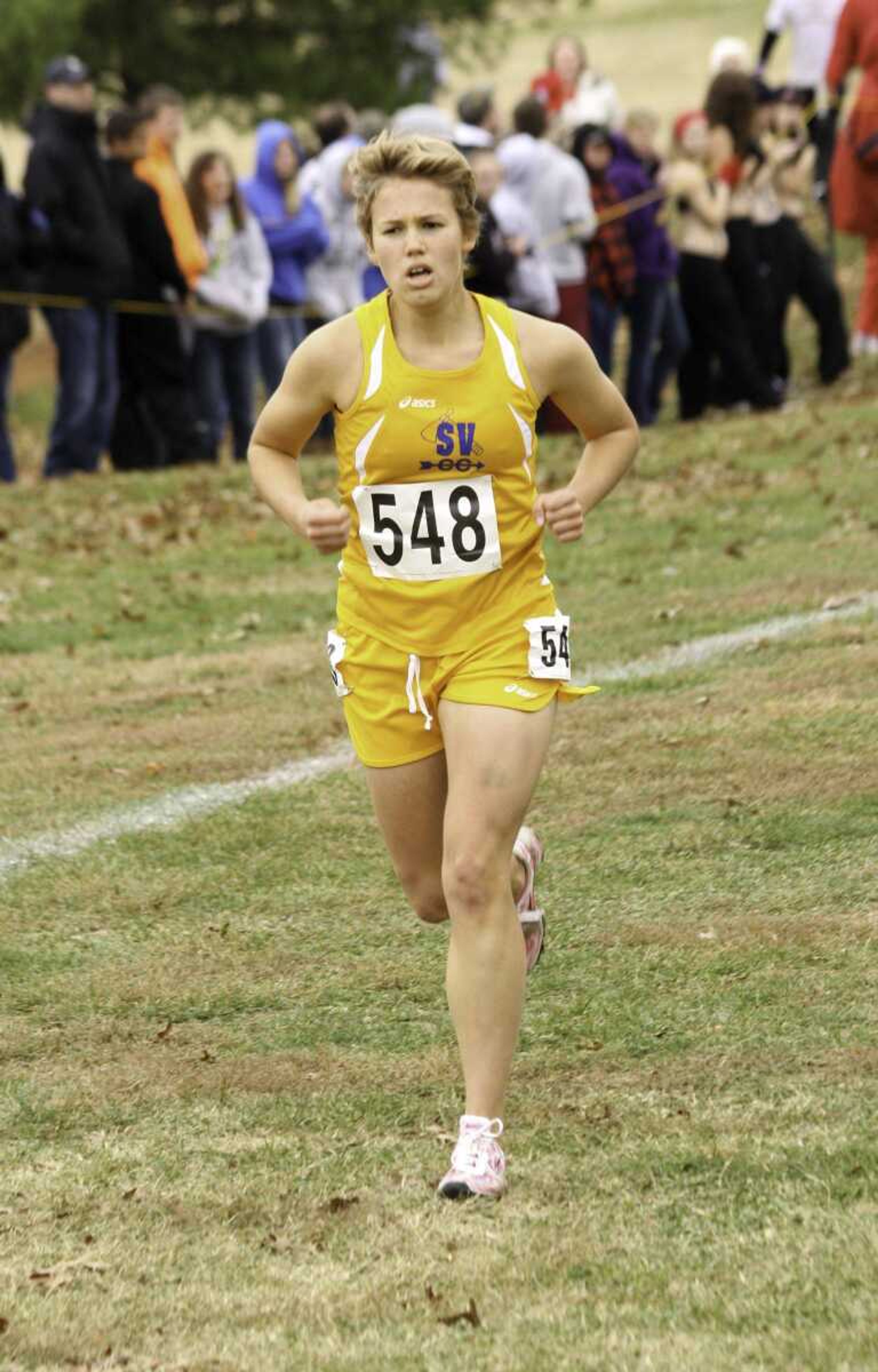 St. Vincent senior Laura Steele makes the climb up the finish stretch at the Class 1 state cross country meet Saturday. She finished 12th to earn all-state honors.