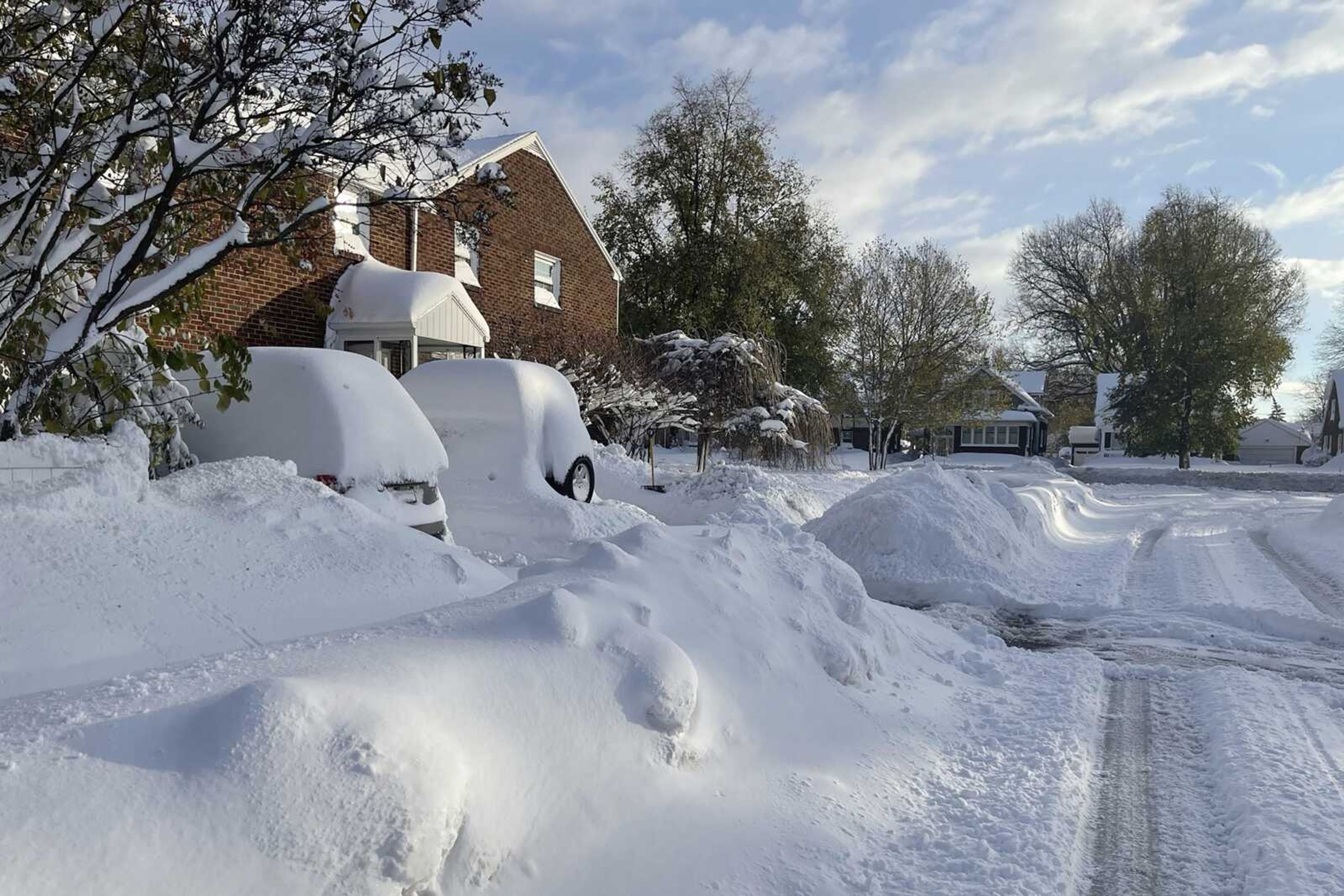 Snow covers the ground Saturday in Buffalo, New York. Residents of northern New York state are digging out from a dangerous lake-effect snowstorm that had dropped nearly 6 feet of snow in some areas and caused three deaths.