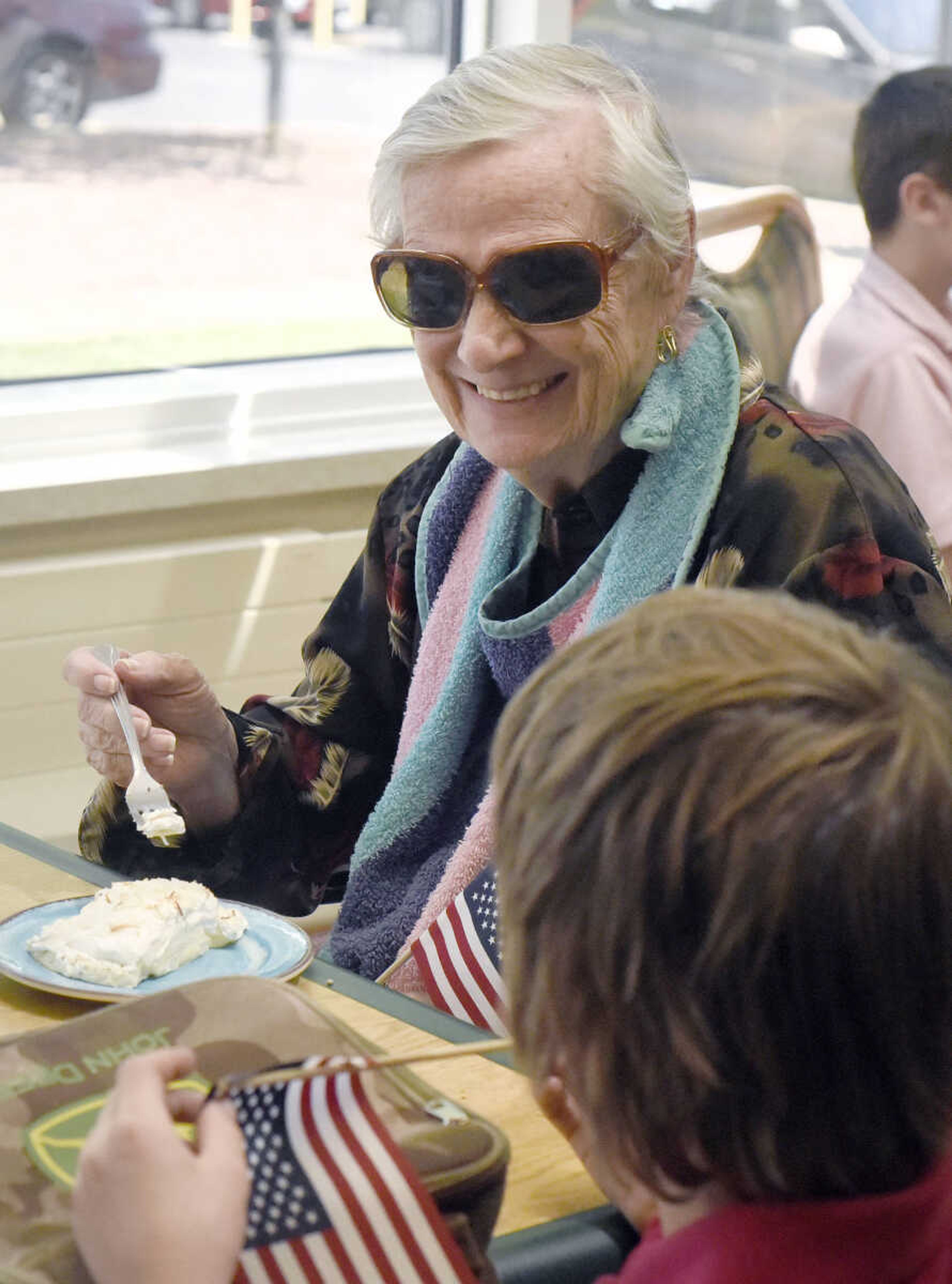 Doris Livingston visits with Prodigy Leadership Academy student, Waylon Mulholland, over lunch on Tuesday, April 25, 2017, at the Missouri Veterans Home in Cape Girardeau.