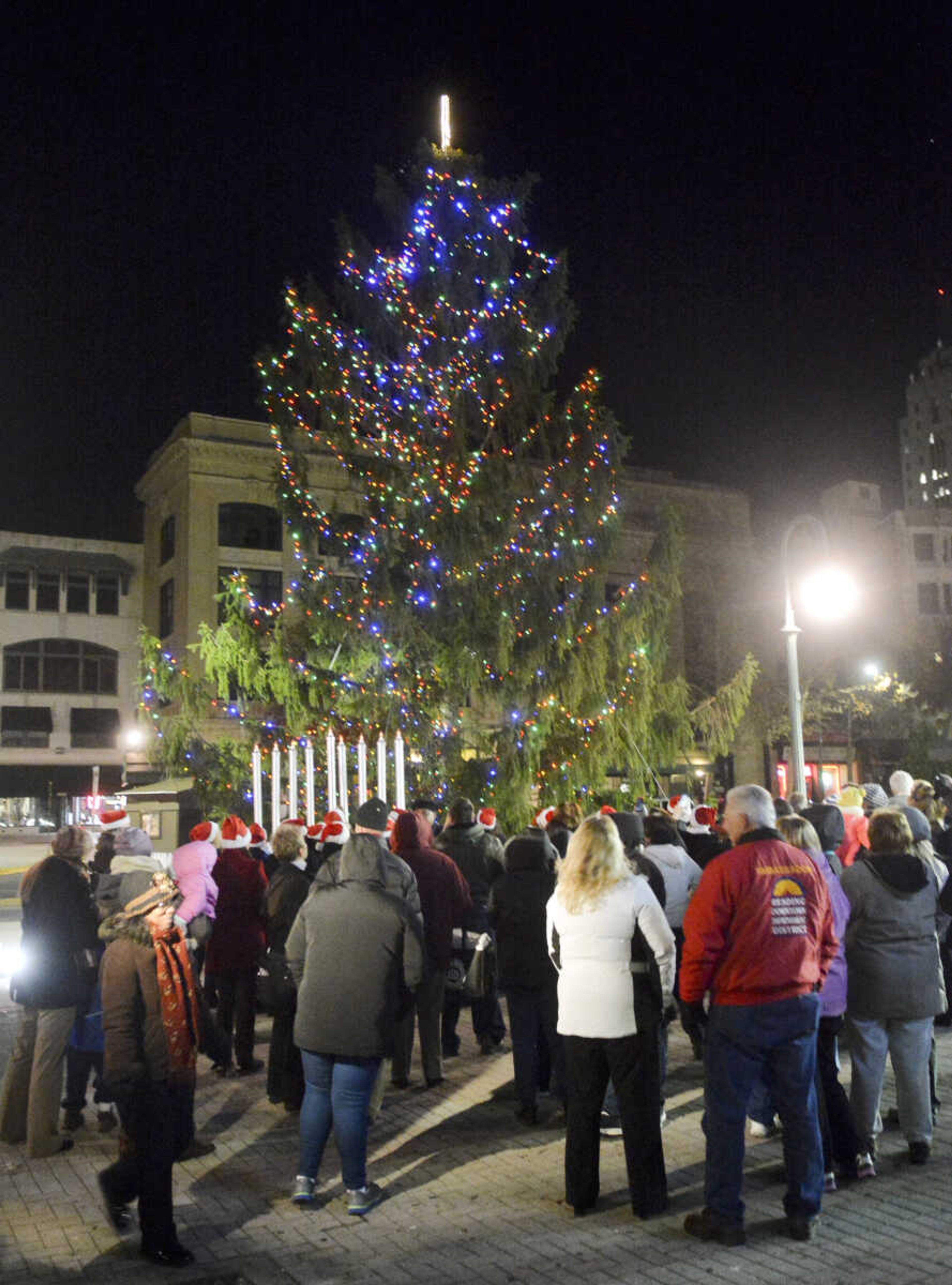 Residents look on duing the Christmas-tree lighting Friday in Reading, Pennsylvania. (Ben Hasty ~ Reading Eagle)