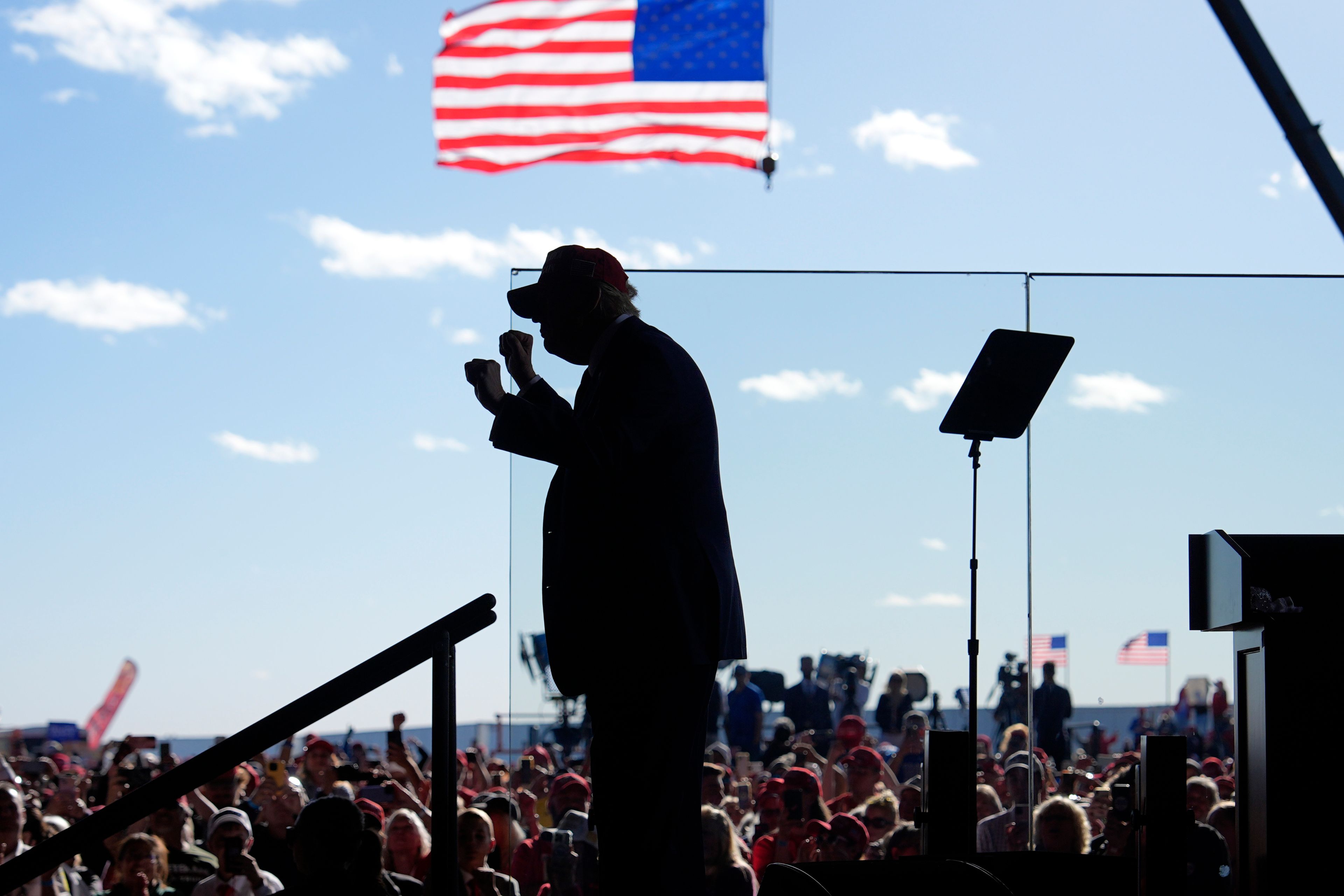 Republican presidential nominee former President Donald Trump dances as he departs after speaking during a campaign rally at Dodge County Airport, Sunday, Oct. 6, 2024, in Juneau, Wis. (AP Photo/Julia Demaree Nikhinson)