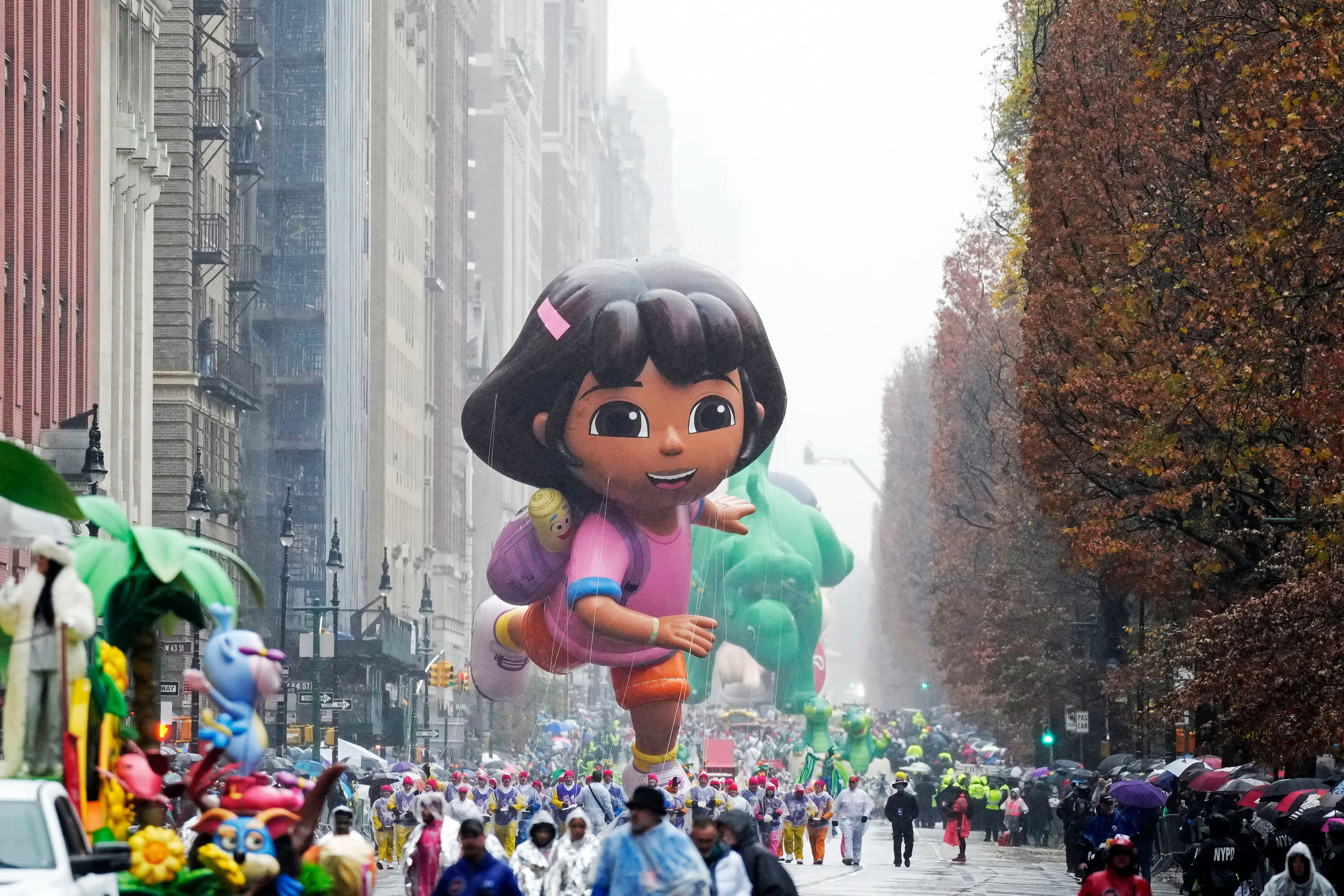 The Dora the Explorer balloon floats in the Macy's Thanksgiving Day Parade on Thursday, Nov. 28, 2024, in New York. (Photo by Charles Sykes/Invision/AP)