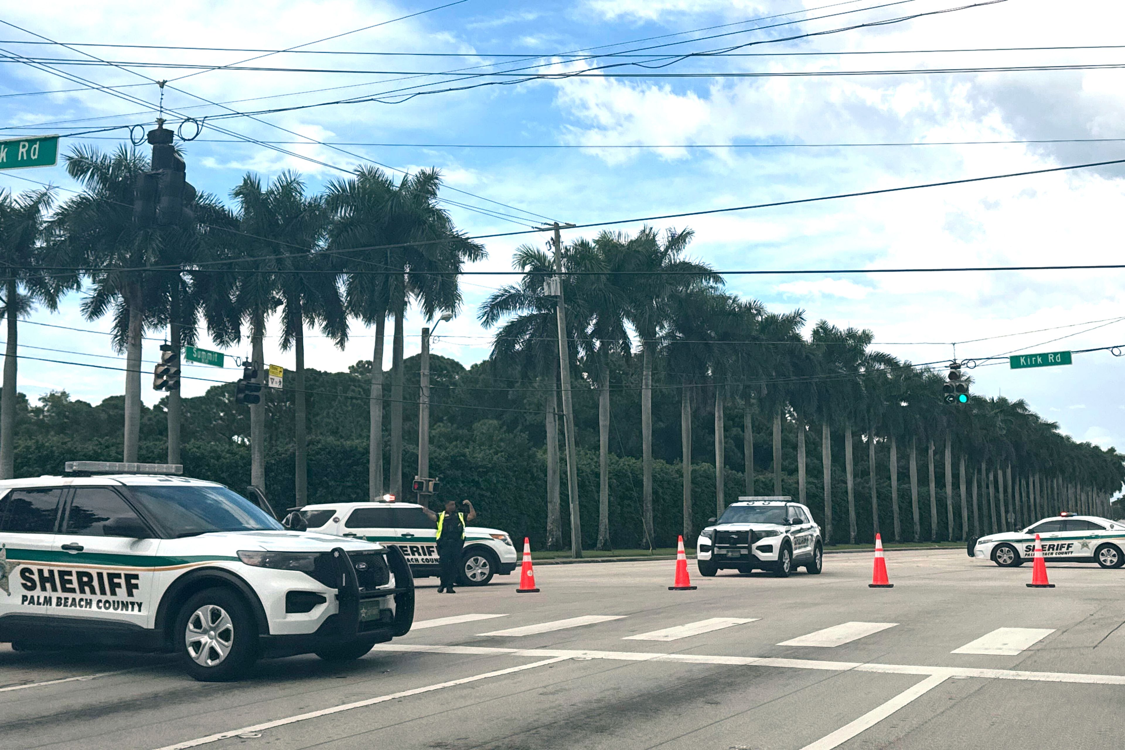 Sheriff vehicles are pictured near Trump International Golf Club, Sunday. Sept. 15, 2024, in West Palm Beach, Fla., after gunshots were reported in the vicinity of Republican presidential candidate former President Donald Trump. (AP Photo/Stephany Matat)