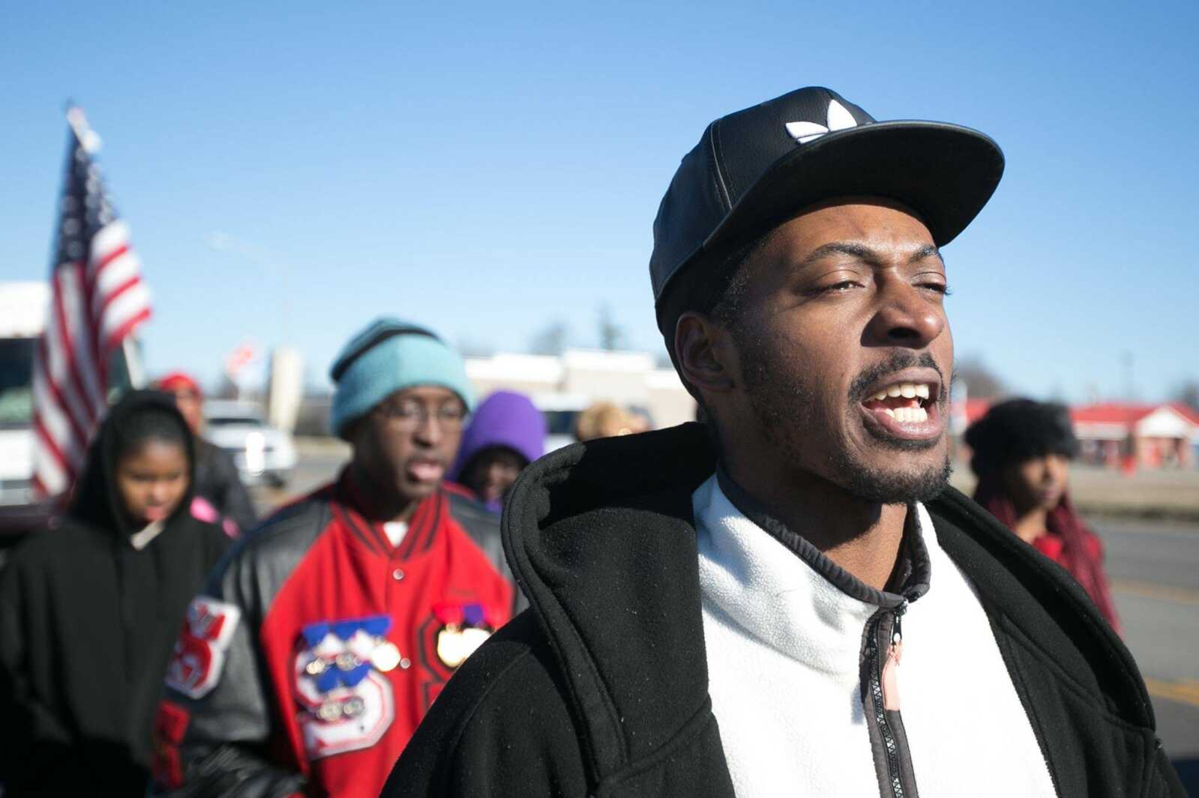 Corlin Turner marches Monday with Sikeston, Missouri, community members to rally support to change the name of the city's Main Street to honor Dr. Martin Luther King Jr. in Sikeston. (Glenn Landberg)