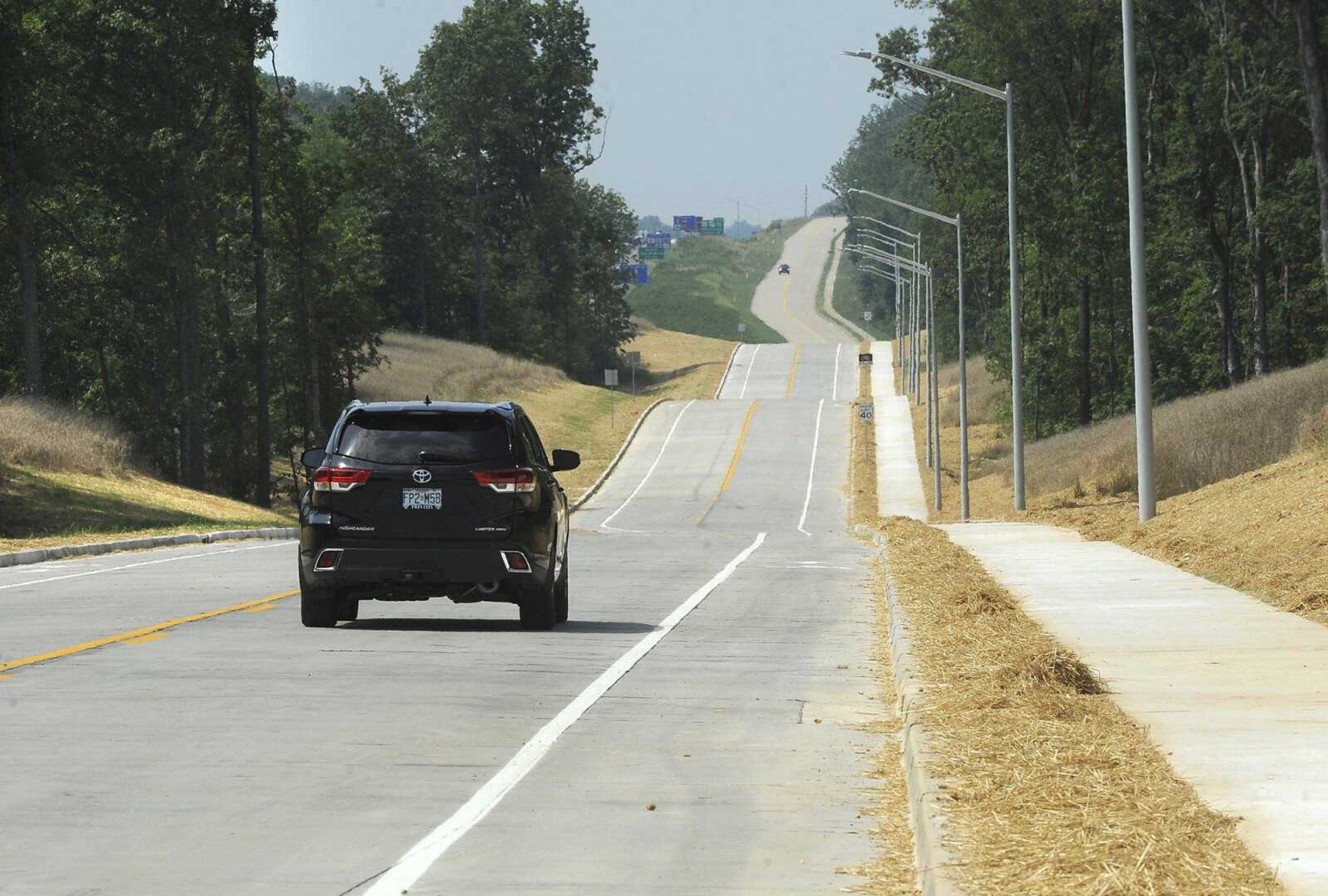 A motorist travels north Thursday on the new section of Veterans Memorial Drive from near Hopper Road in Cape Girardeau.