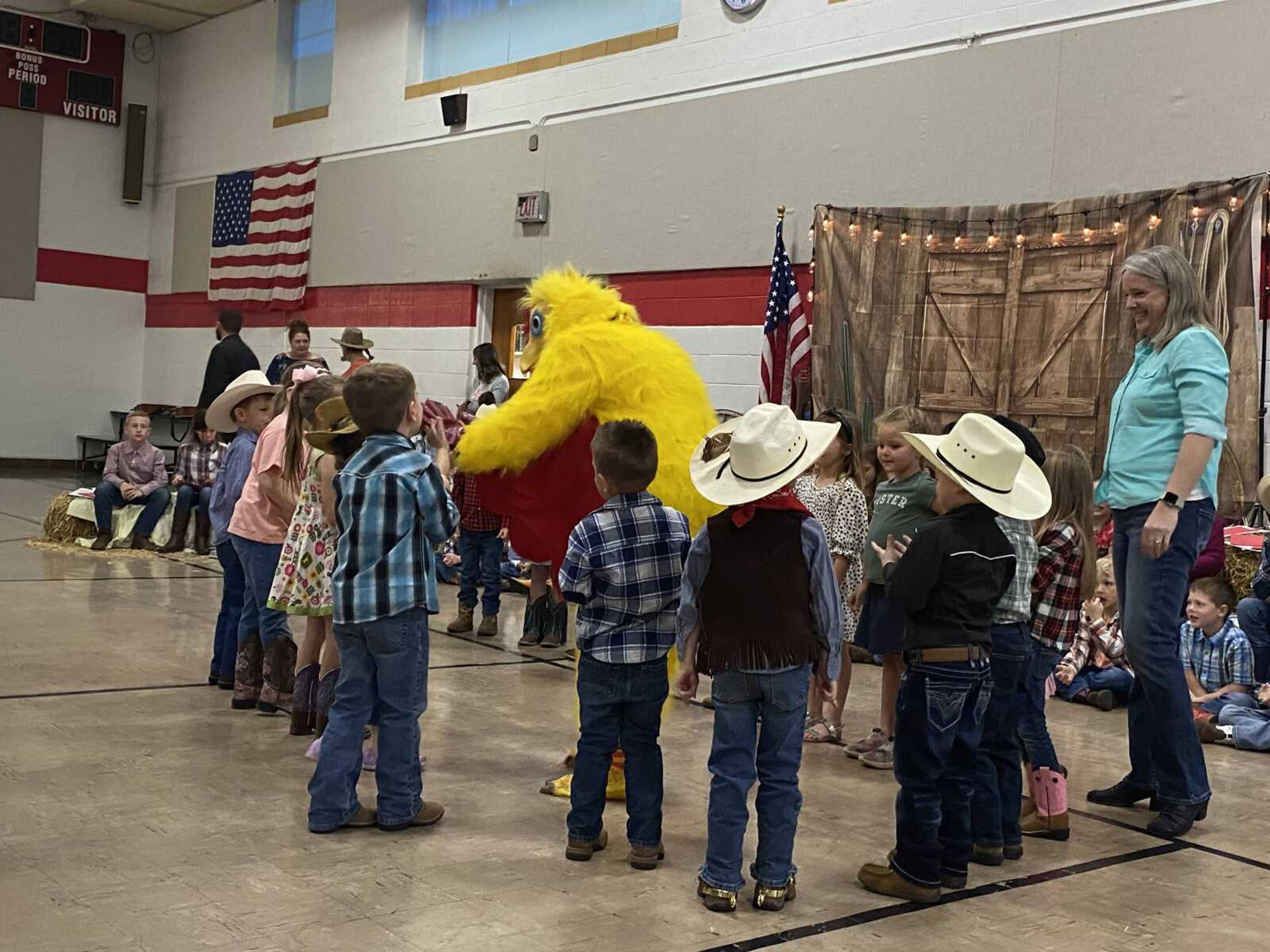 The big chicken came out to dance the "Chicken Dance" with the pre-k students.  The students really enjoyed this dance.
