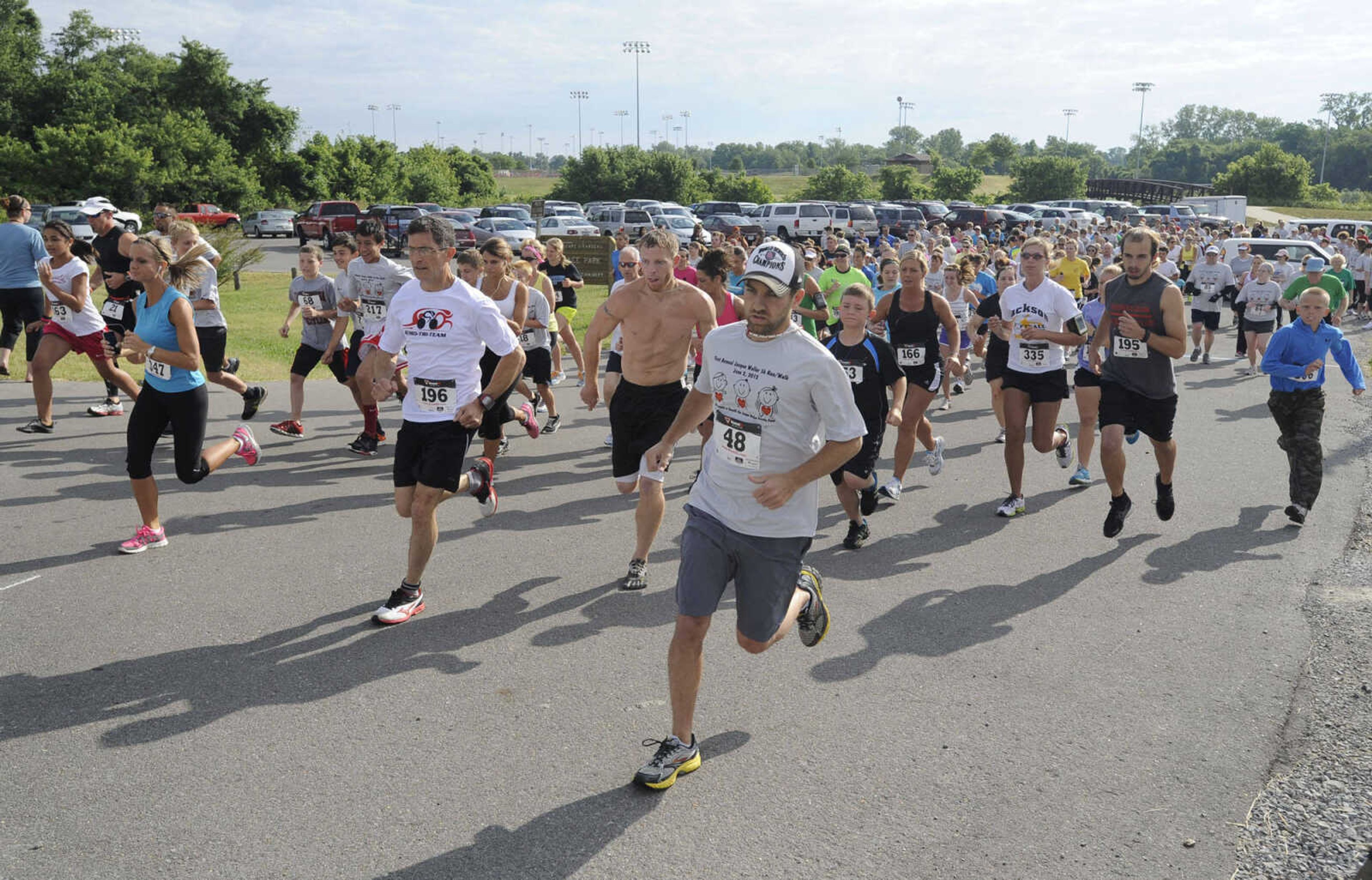 Runners begin the Jacque Waller 5K walk/run.