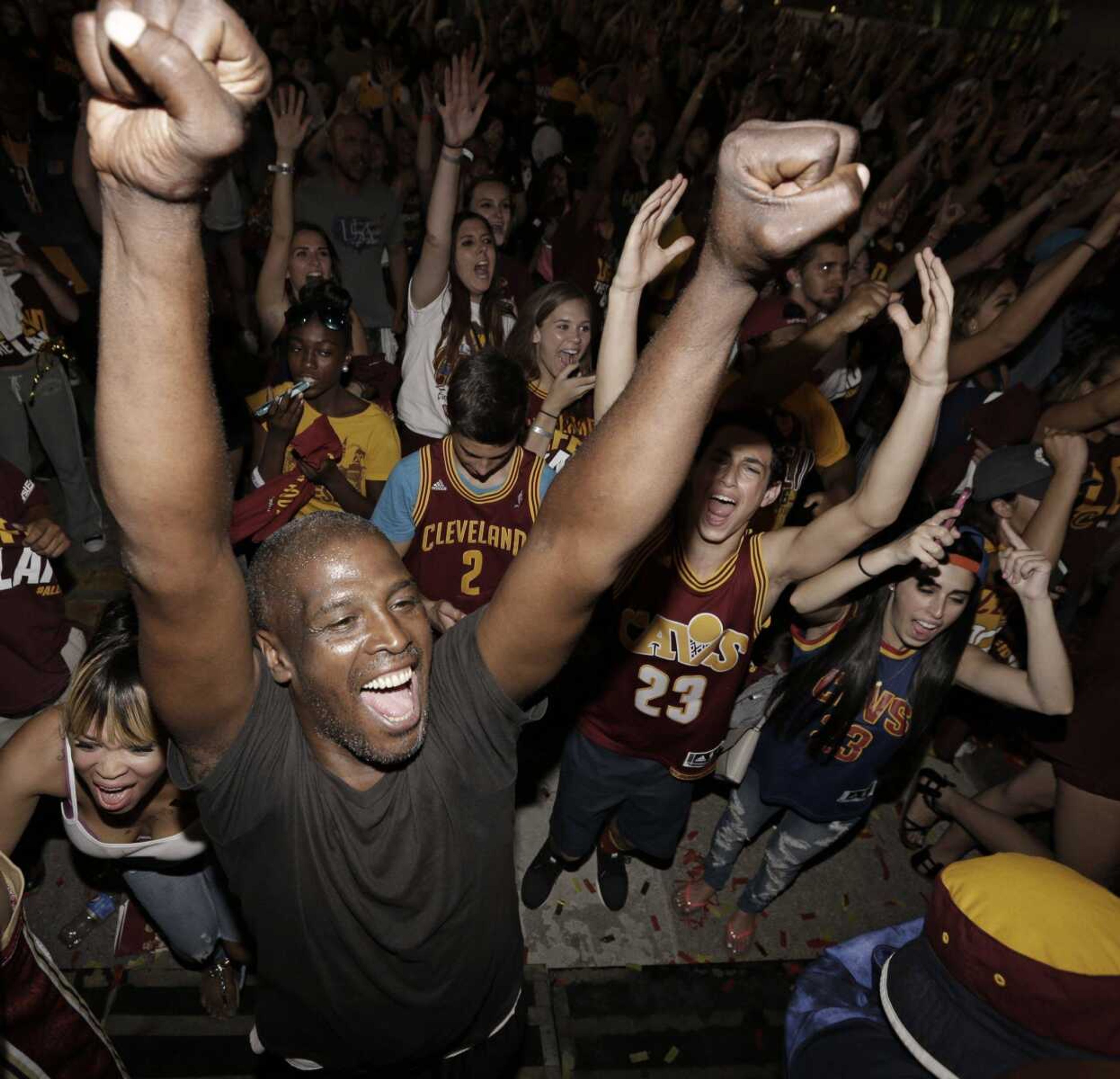 Cavaliers fans celebrate at a watch party on Sunday in Cleveland after the Cavaliers defeated the Warriors in Game 7 of the NBA Finals.