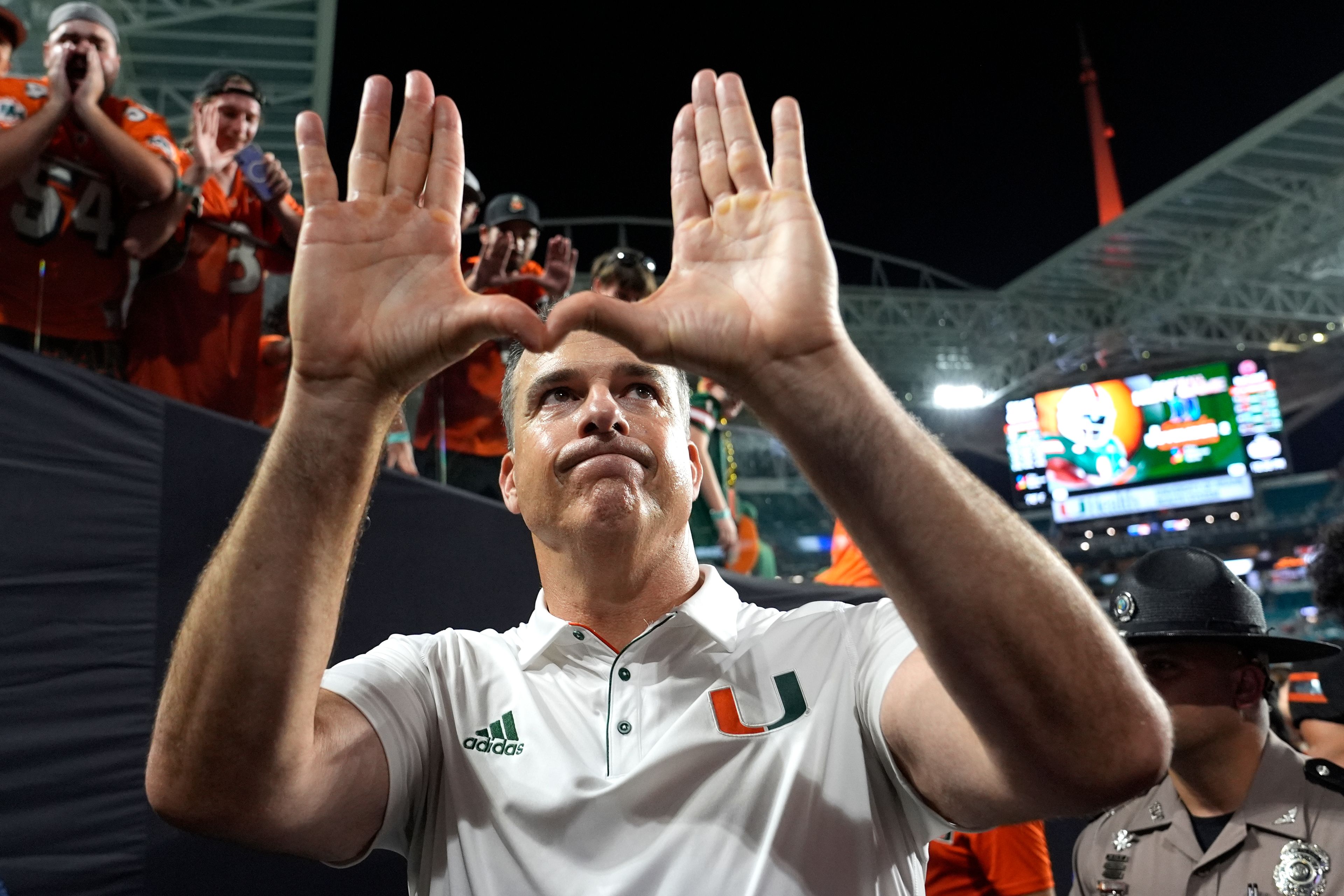 Miami head coach Mario Cristobal acknowledges the crowd after an NCAA college football game against Florida State, Saturday, Oct. 26, 2024, in Miami Gardens, Fla. (AP Photo/Lynne Sladky)