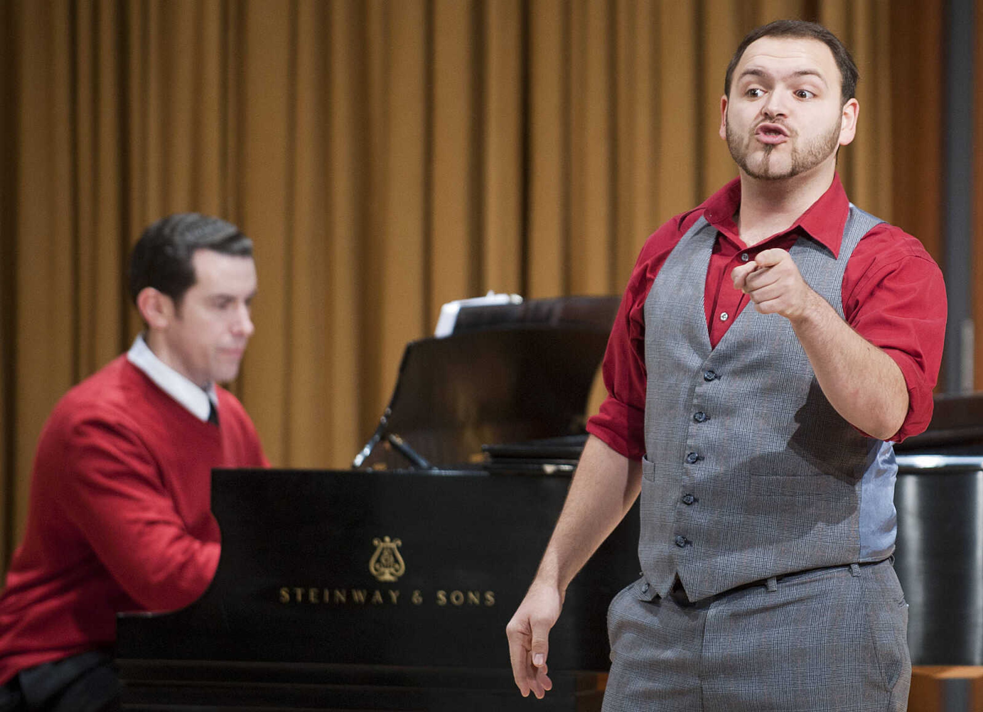 Southeast Missouri State University student Kyle Morr, right, is accompanied on piano by musical theatre instructor Joe Mason as he sings "Those Were the Good Ol' Days," from the musical "Damn Yankees," during the Class Voice III Recital Sunday, Dec. 15, at the Shuck Recital Hall. Fifteen Southeast students performed during the annual recital which is in its sixth year.