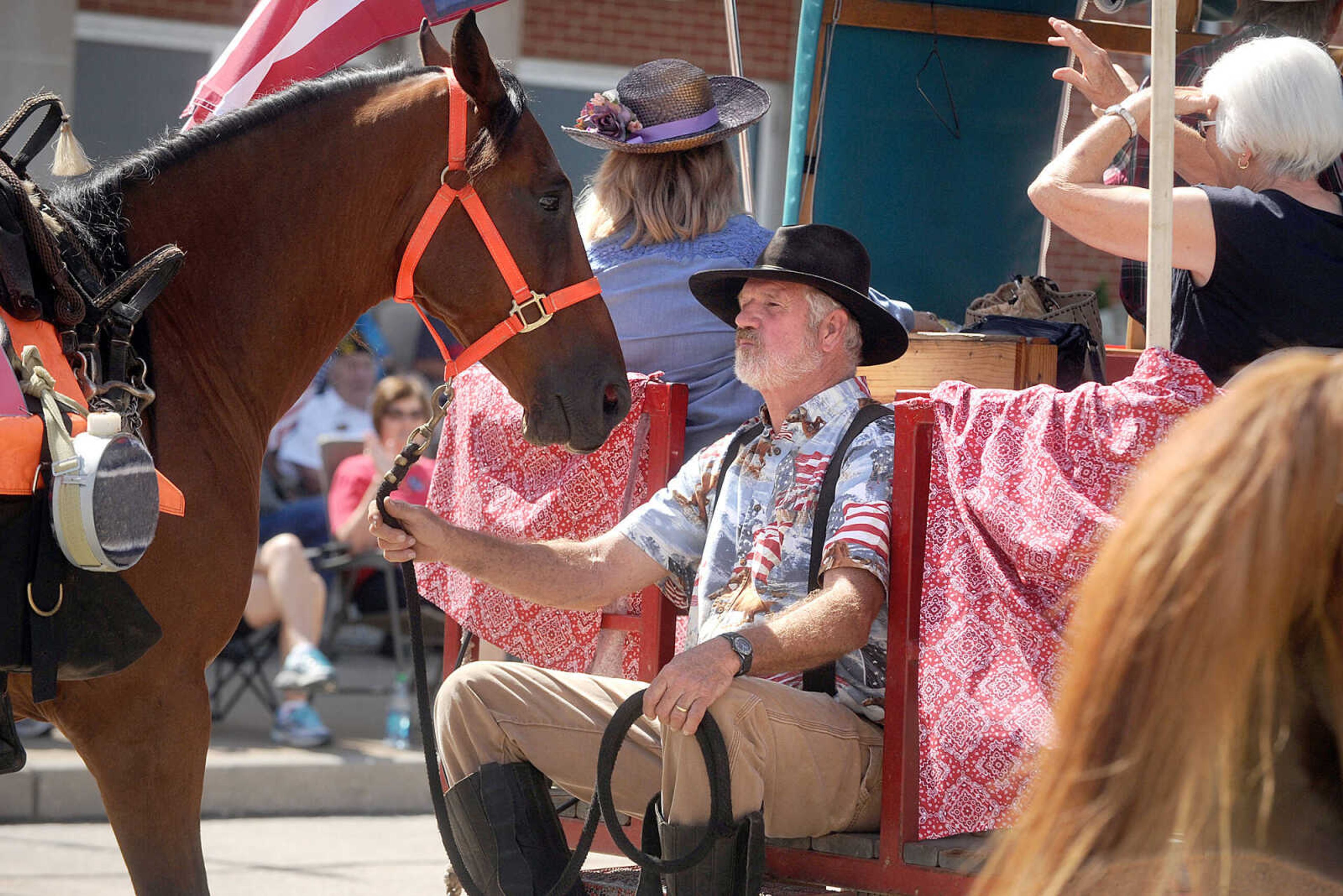 LAURA SIMON ~ lsimon@semissourian.com


People line the sidewalks as old-time horse drawn carriages head down High Street in Jackson, Saturday, July 5, 2014, during the Bicentennial Wagon Trail Parade.