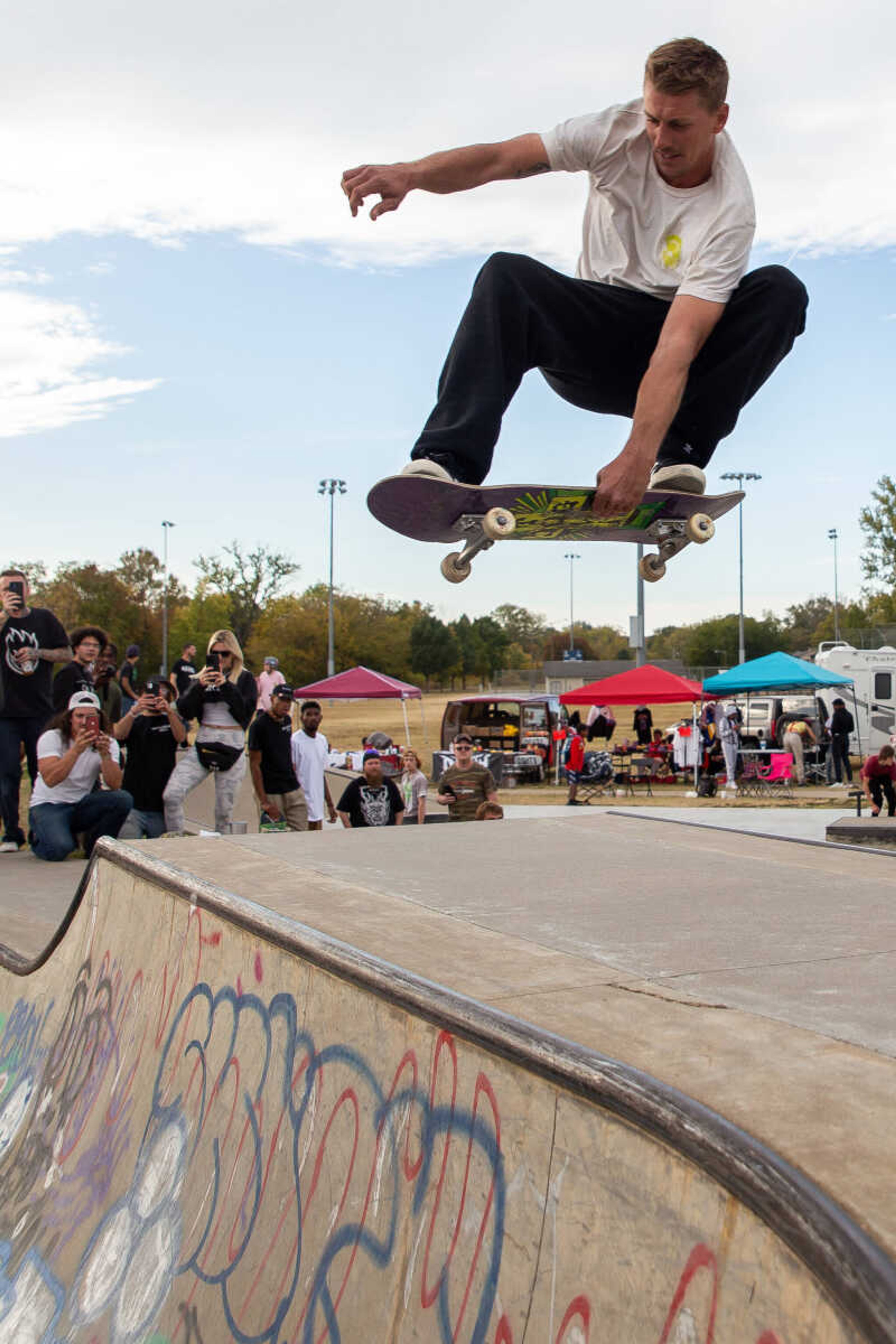 Justin Smolenski grabs his board as he pulls off an epic jump into the bowl during the Blood Bash.