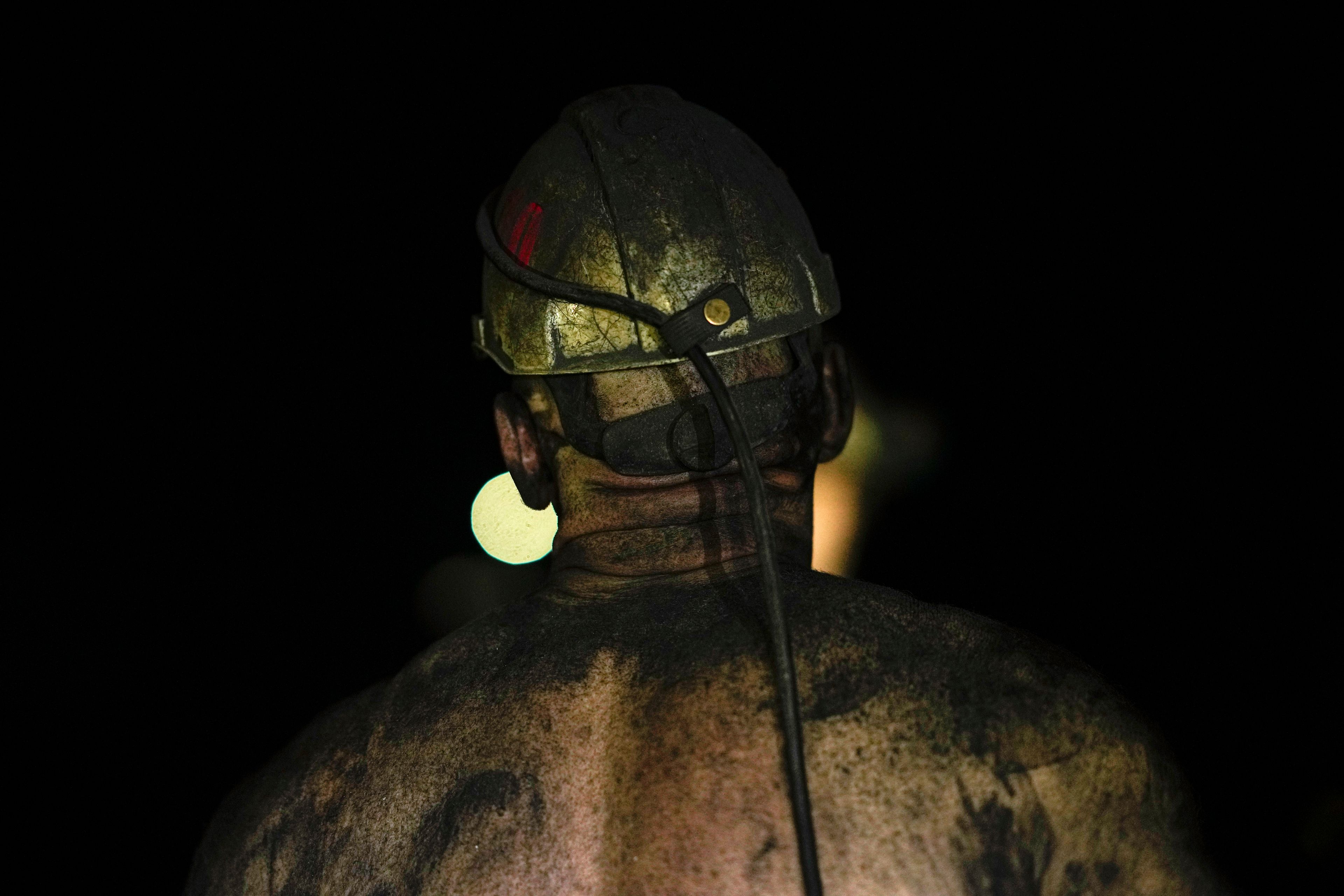 A miner walks in a shaft of the CSM coal mine in Stonava, Czech Republic, Monday, Oct. 14, 2024. (AP Photo/Petr David Josek)