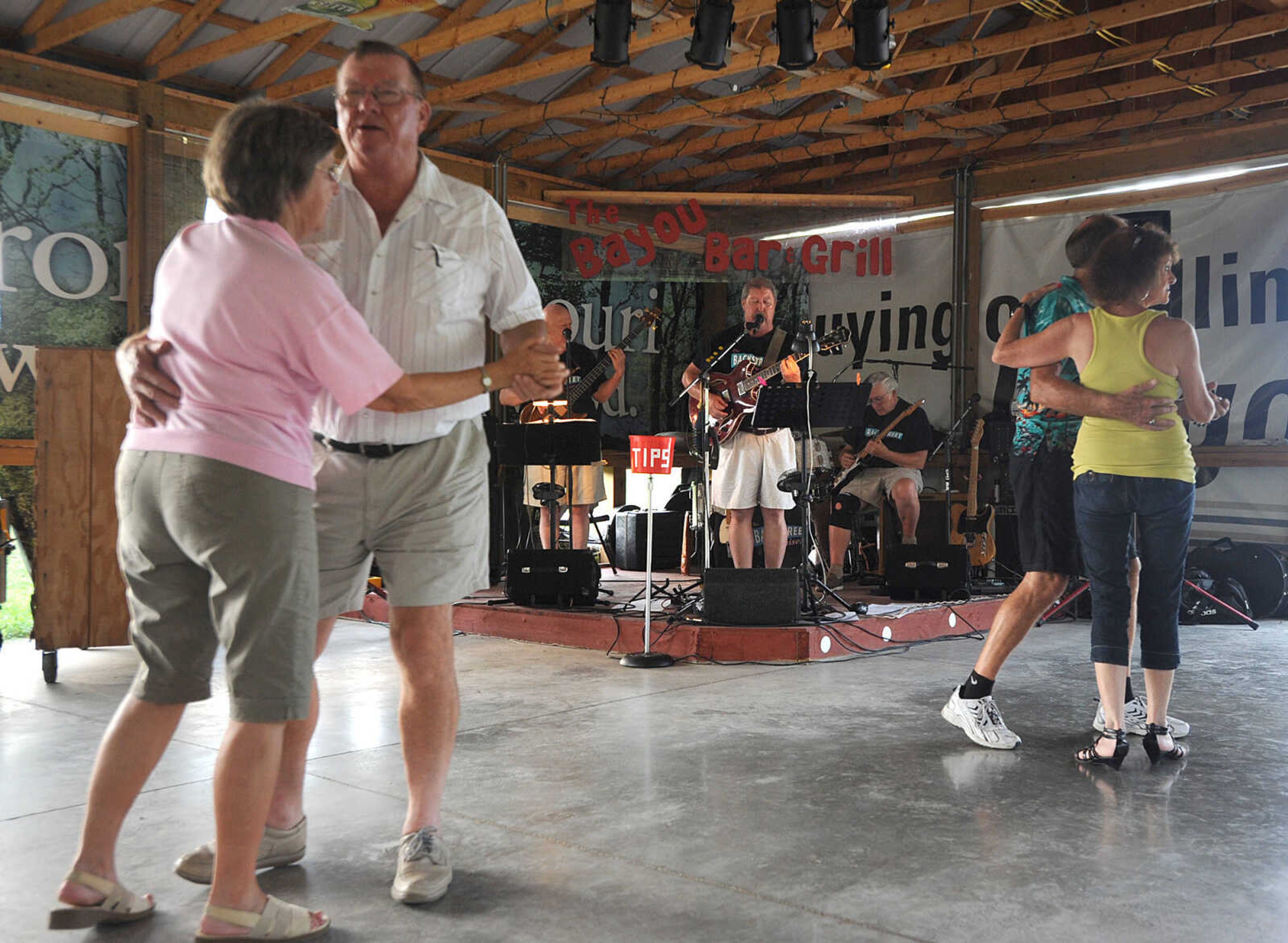 LAURA SIMON ~ lsimon@semissourian.com
Guests enjoy music from the Backstreet Cruisers Sunday, July 8, 2012 at the Bayou Bar & Grill in Pocahontas, Mo. The St. Louis based band performs music from the 1950's and 60's.