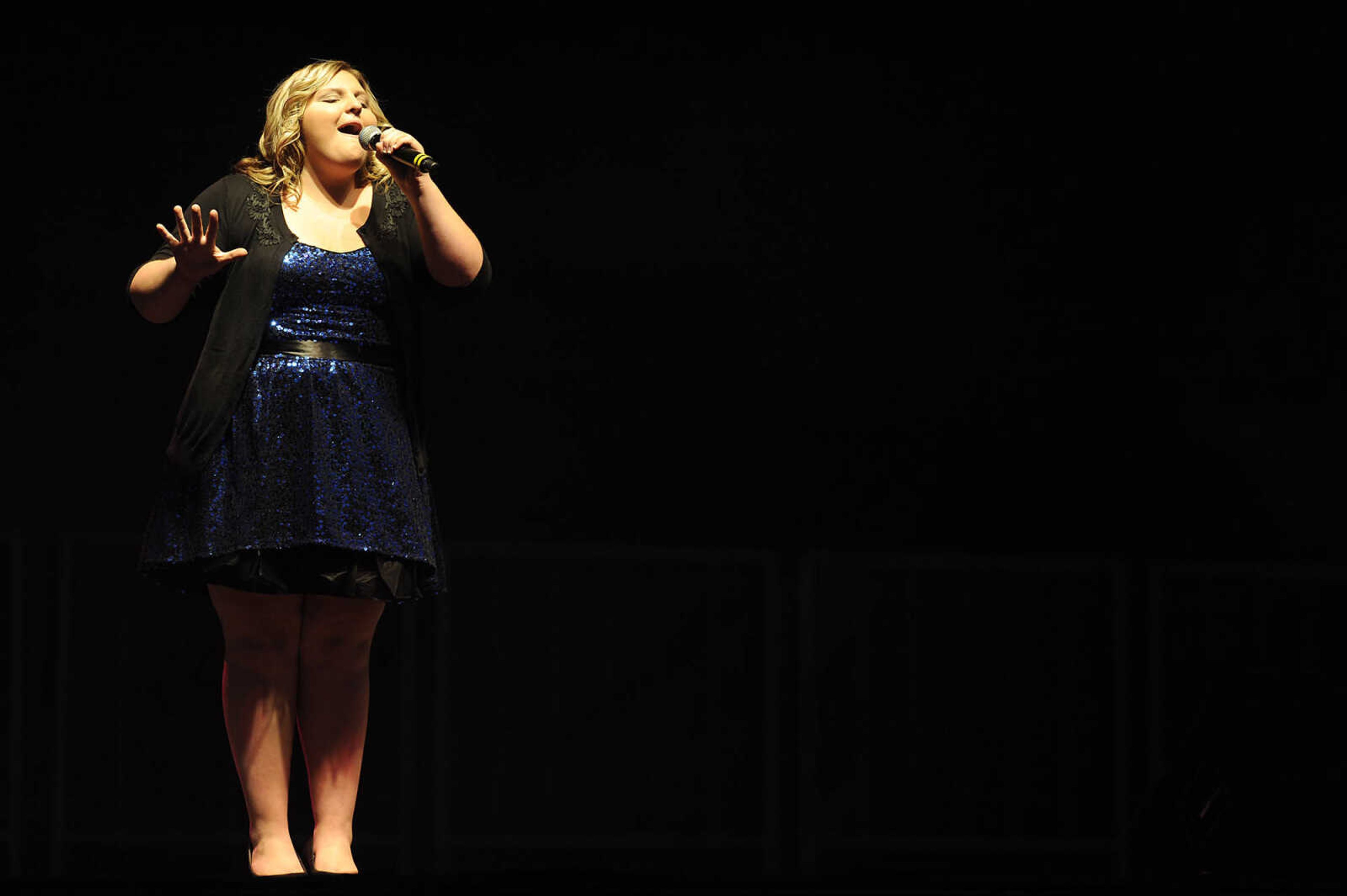 Olivia Gordon of Anna, Ill., performs in the finals 2012 Heartland Idol competition at at the SEMO District Fair Wednesday, September 12, at Arena Park in Cape Girardeau.