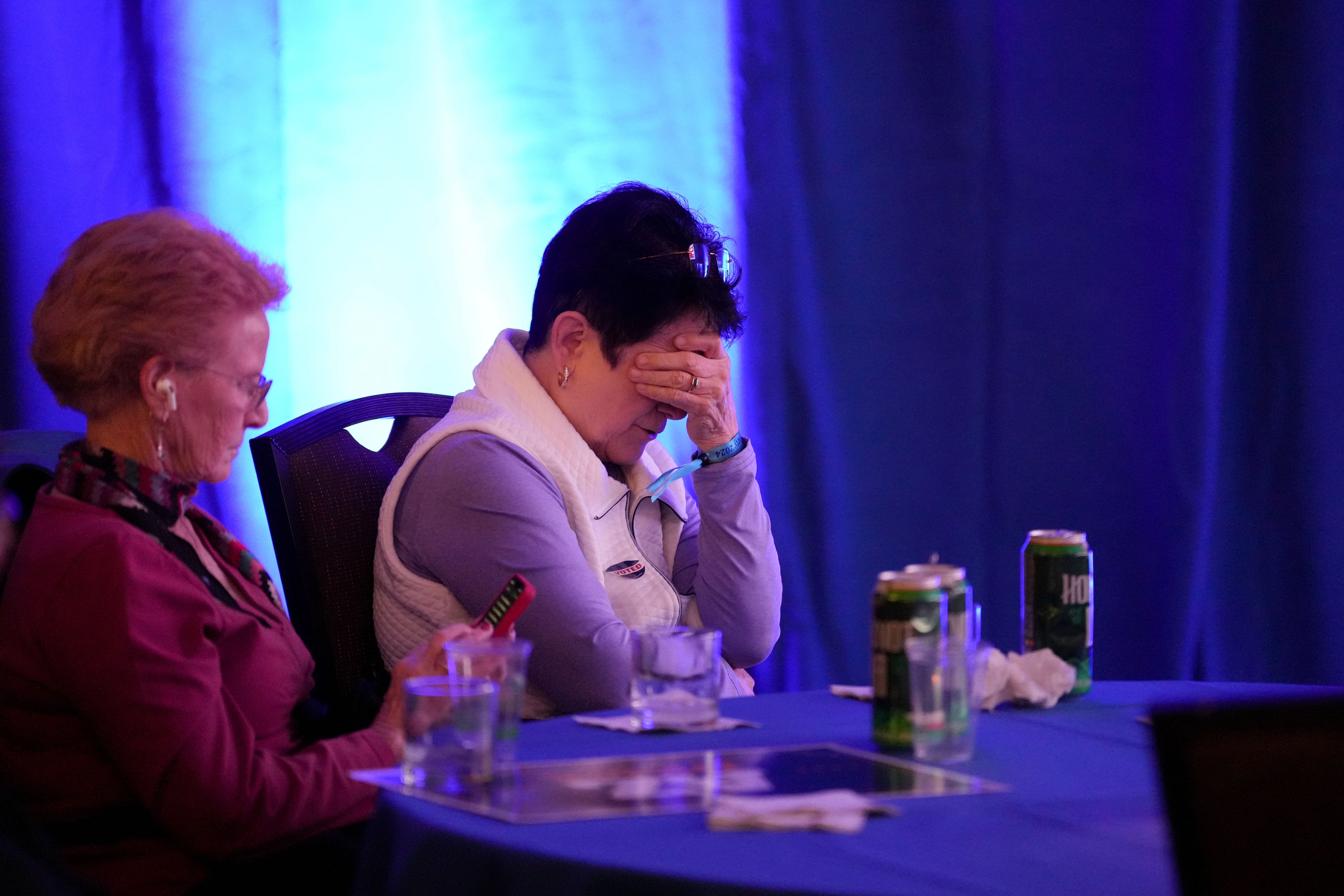 People attend an Arizona Democrats watch party on election night Tuesday, Nov. 5, 2024, in Phoenix. (AP Photo/Ross D. Franklin)