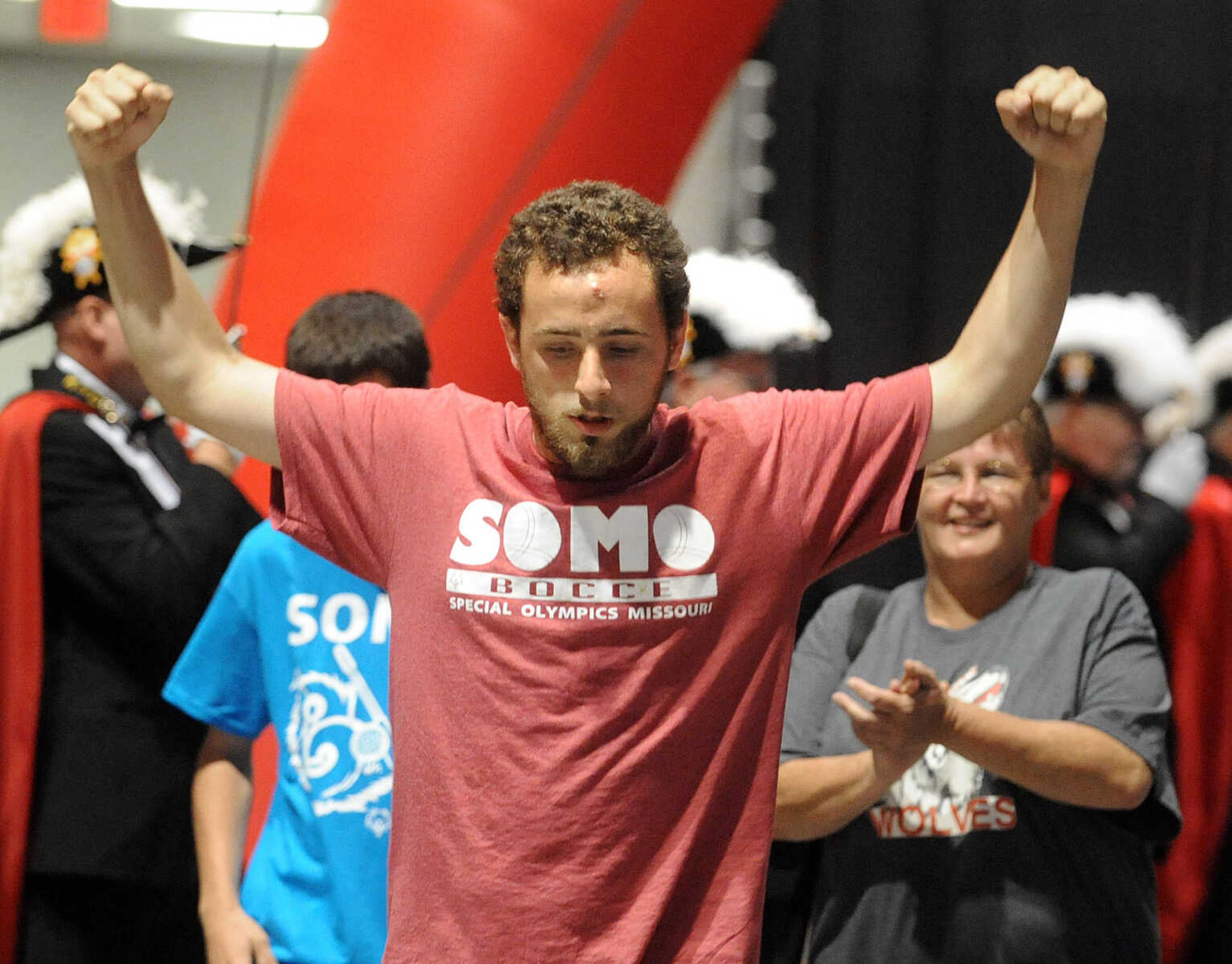 LAURA SIMON ~ lsimon@semissourian.com

Special Olympic athletes are greeted by fans, the Knights of Columbus, and the Southeast Missouri State gymnastics team, Friday, Oct. 11, 2013 during the opening ceremony for the Special Olympics Missouri State Fall Games at the Show Me Center.