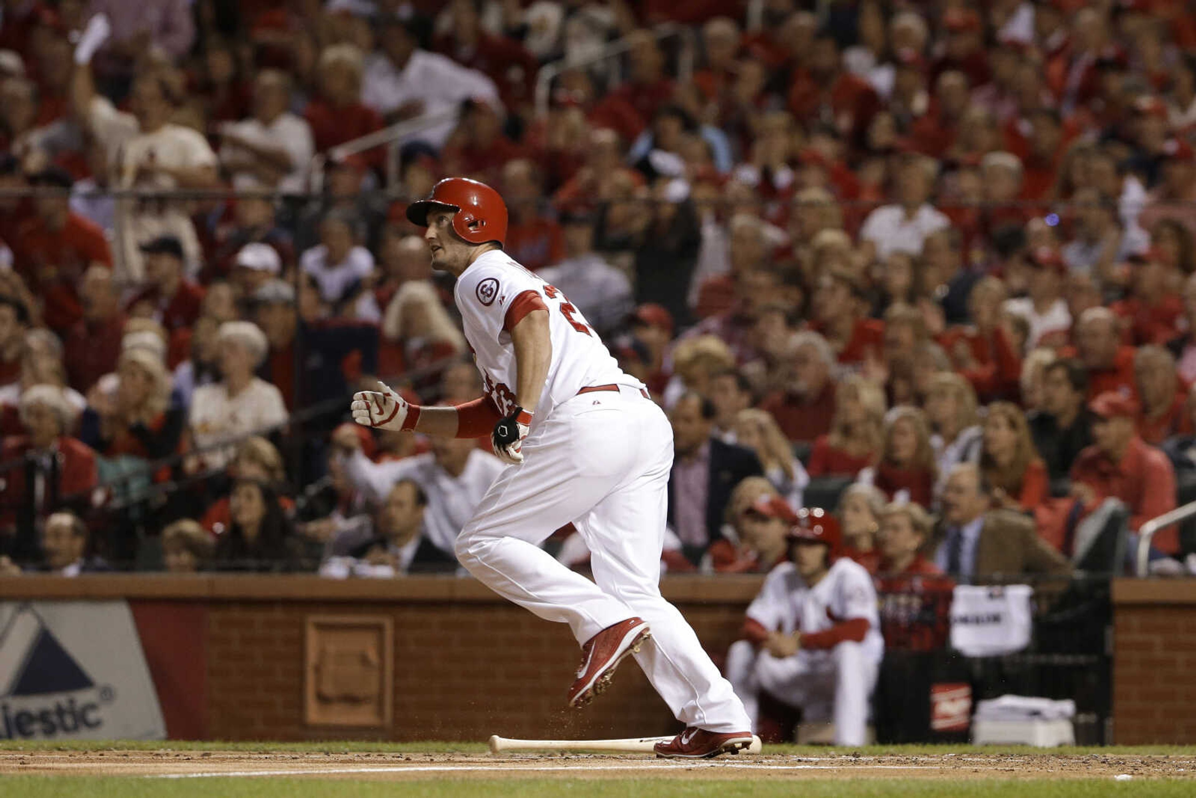 St. Louis Cardinals' David Freese runs to first base after hitting a two-run home run against the Pittsburgh Pirates in the second inning of Game 5 of a National League baseball division series on Wednesday, Oct. 9, 2013, in St. Louis. (AP Photo/Jeff Roberson)