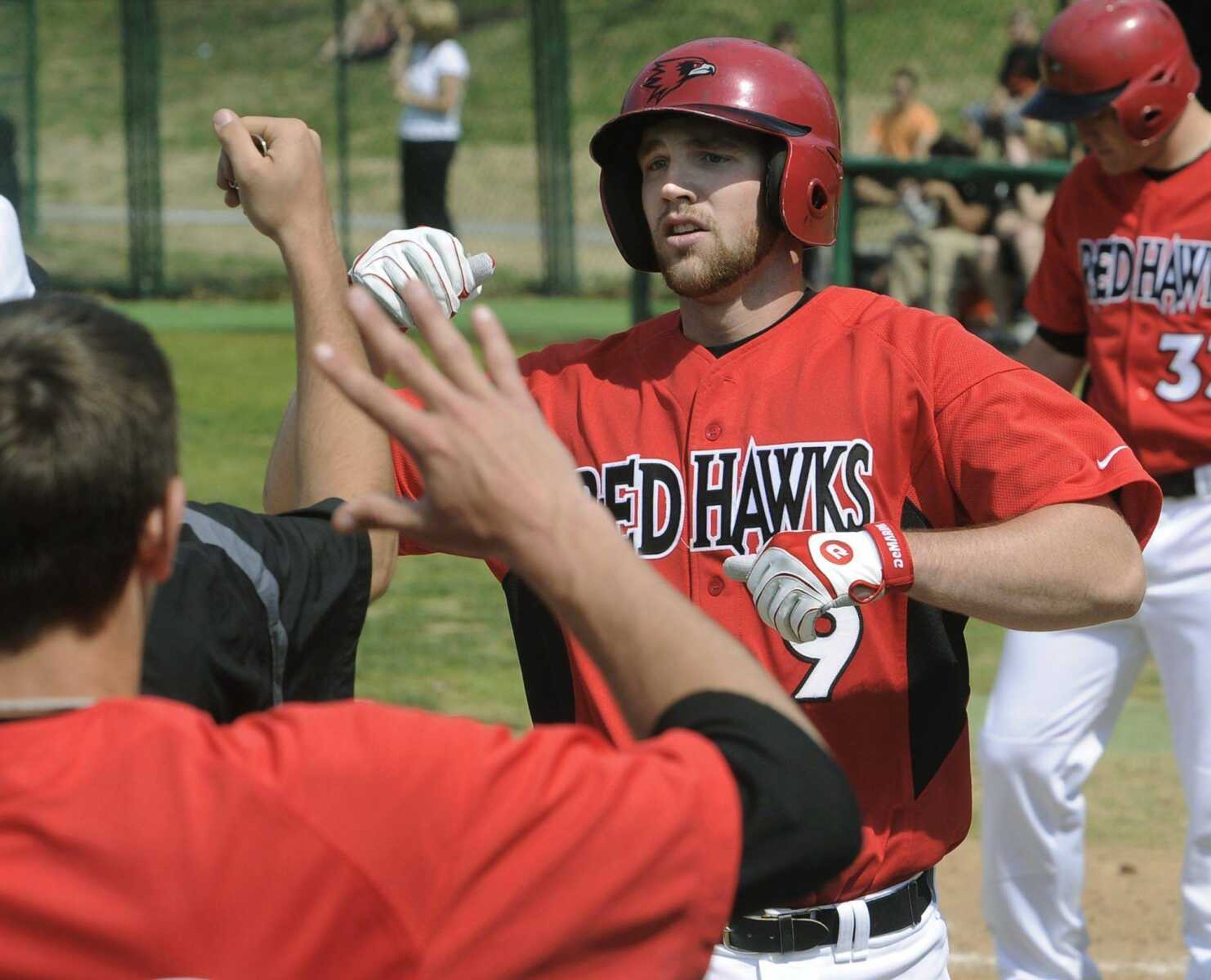 Southeast Missouri State's Trenton Moses is congratulated by teammates after his solo home run against Wright State during their game Sunday at Capaha Field. (Fred Lynch)