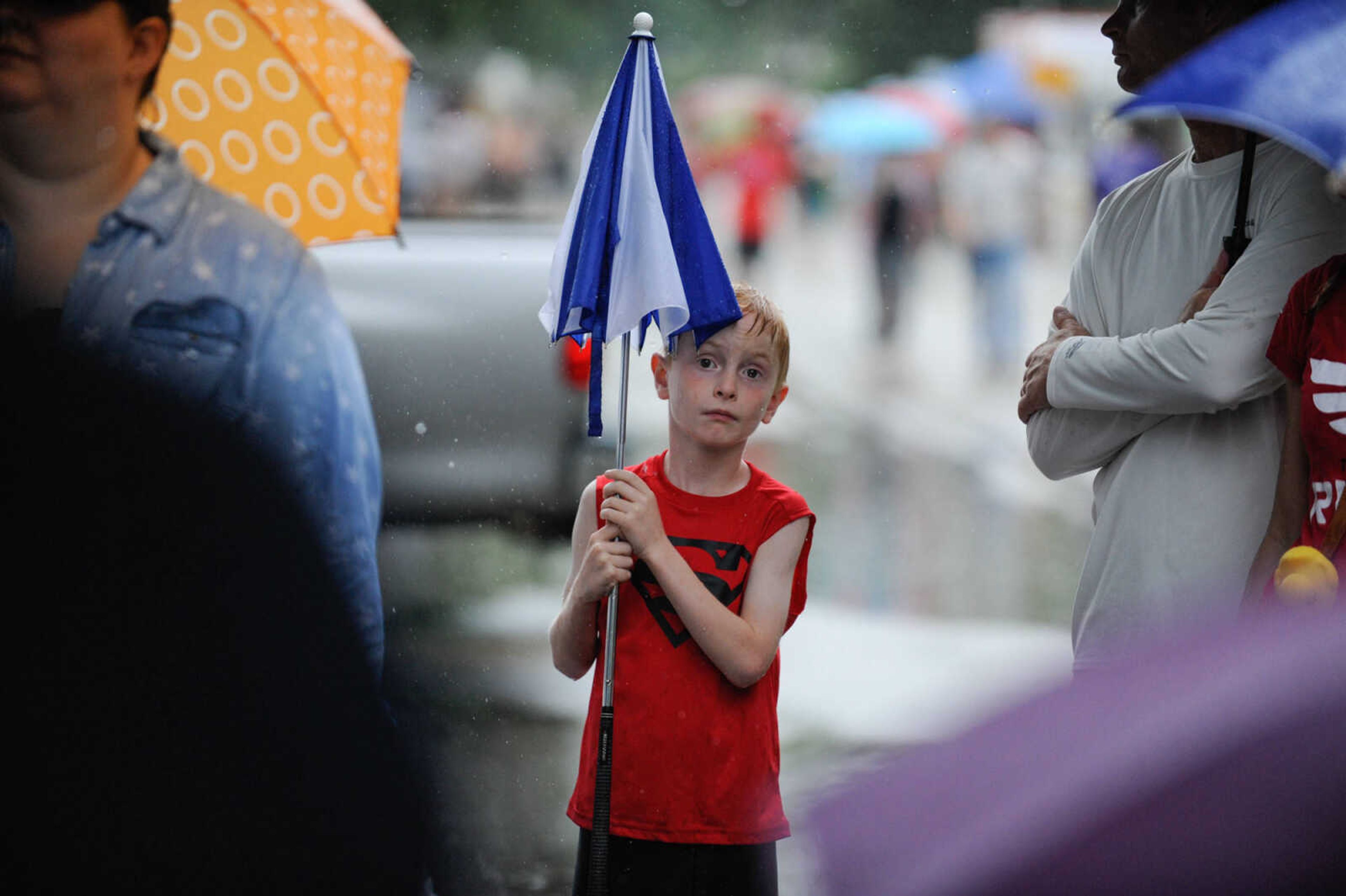 GLENN LANDBERG ~ glandberg@semissourian.com

Crowds brave the rain for the Jackson Fourth of July celebration Monday, July 4, 2016 at Jackson City Park.