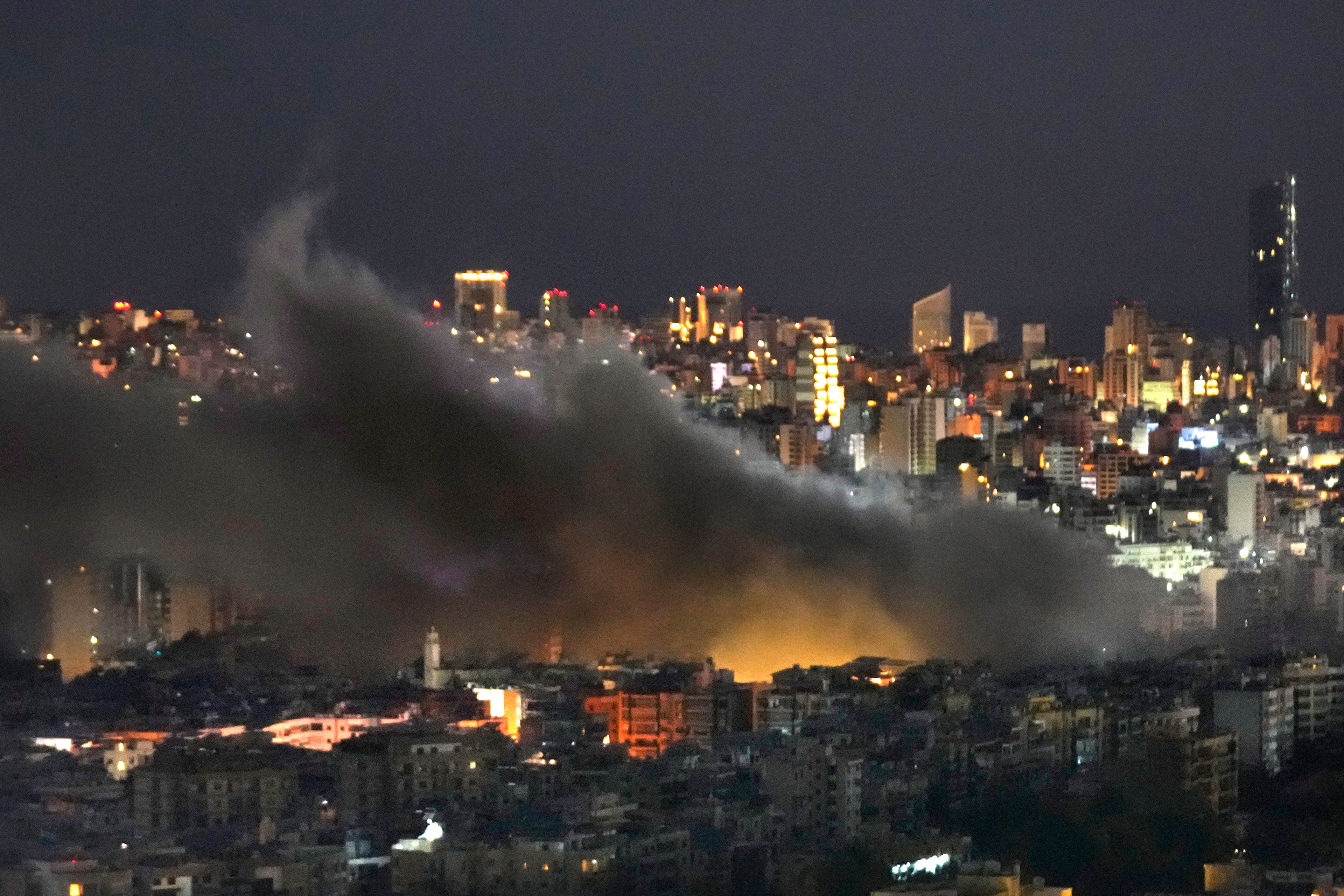 Smoke rises after Israeli airstrikes on Dahiyeh, a southern suburb of Beirut, Lebanon, early Sunday, Oct. 20, 2024. (AP Photo/Hussein Malla)