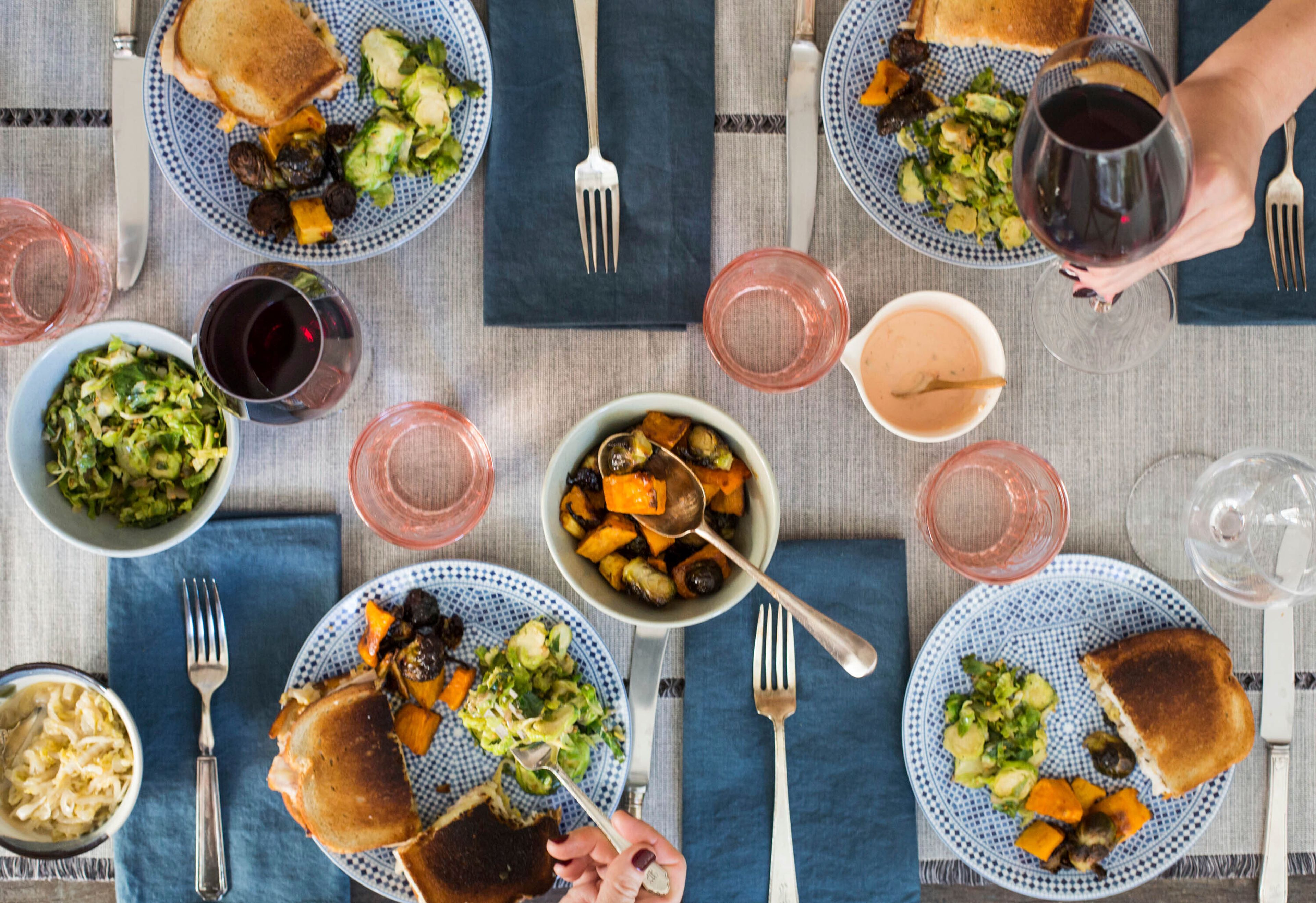 A table spread featuring turkey reuben sandwiches appear in New York on Oct. 17, 2017. (Katie Workman via AP)