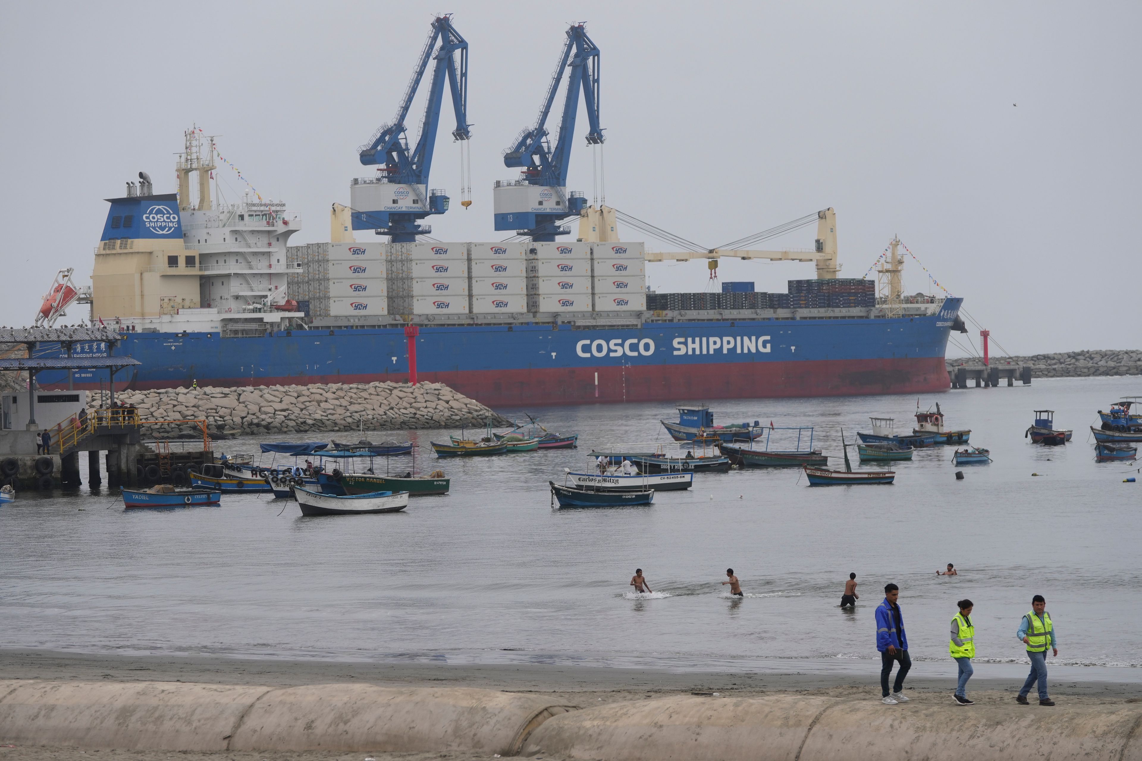 A cargo ship sits in a Chinese-funded port in Chancay, Peru, Tuesday, Nov. 12, 2024. (AP Photo/Silvia Izquierdo)