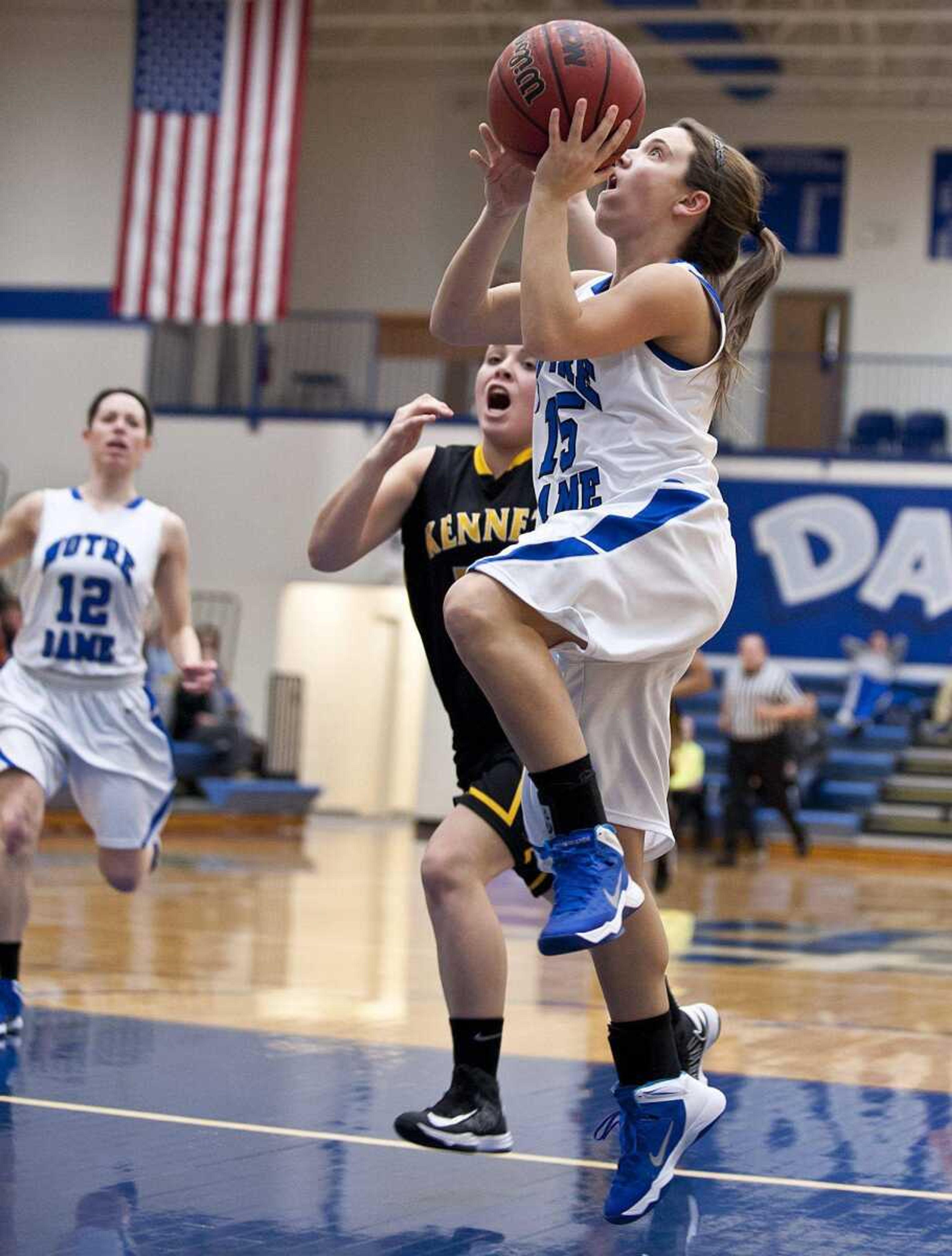 Notre Dame senior Karsen Powers drives past Kennett freshman Hadley Hilburn for a layup after making a steal in the first half of the Bulldog' win over the Indians Thursday, Feb. 6, at Notre Dame Regional High school. (Adam Vogler)