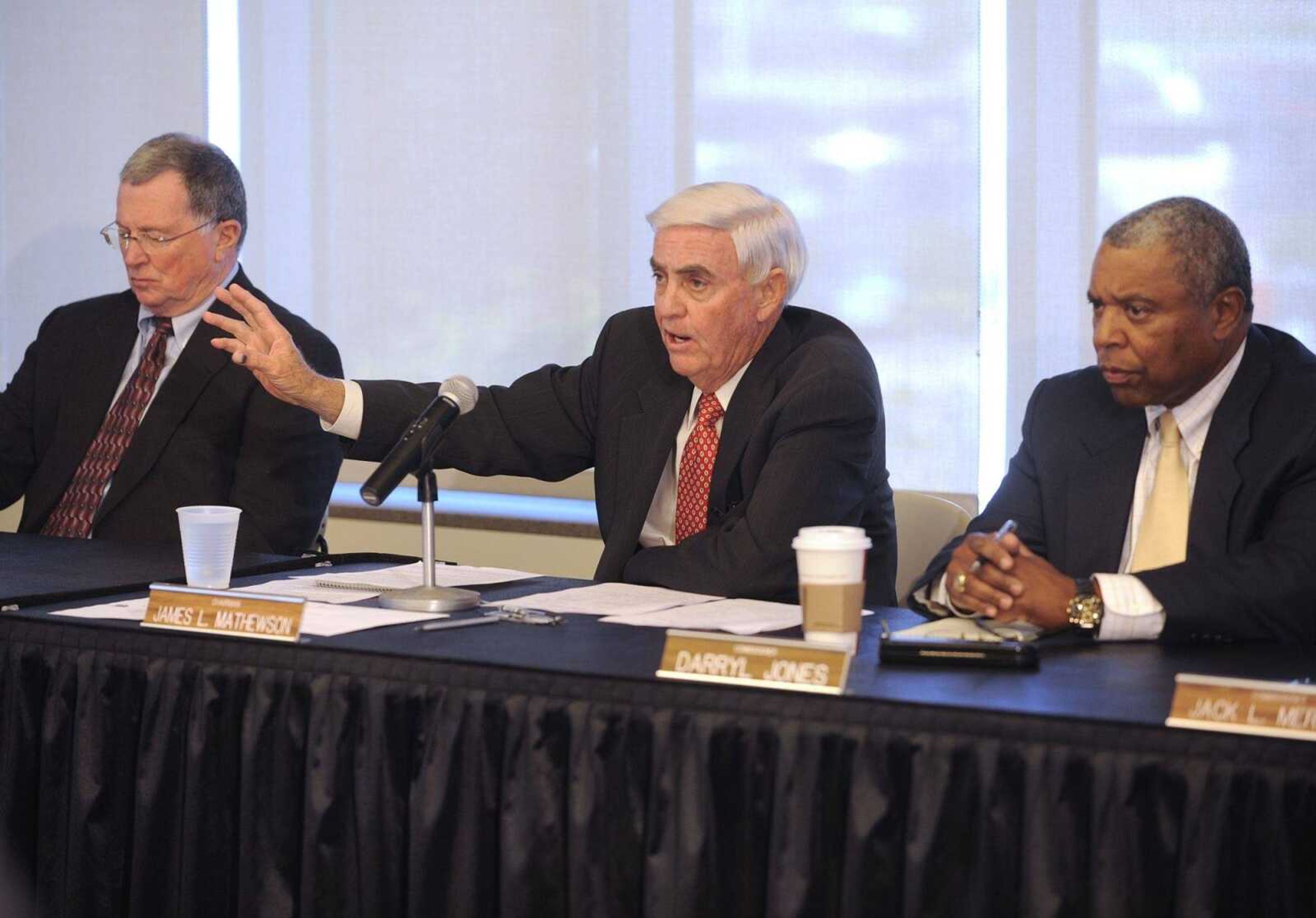 Missouri Gaming Commission chairman Jim Mathewson, center, opens the public hearing with commissioners Noel Shull, left, and Darryl Jones Monday, Sept. 27, 2010 at the River Campus. (Fred Lynch)