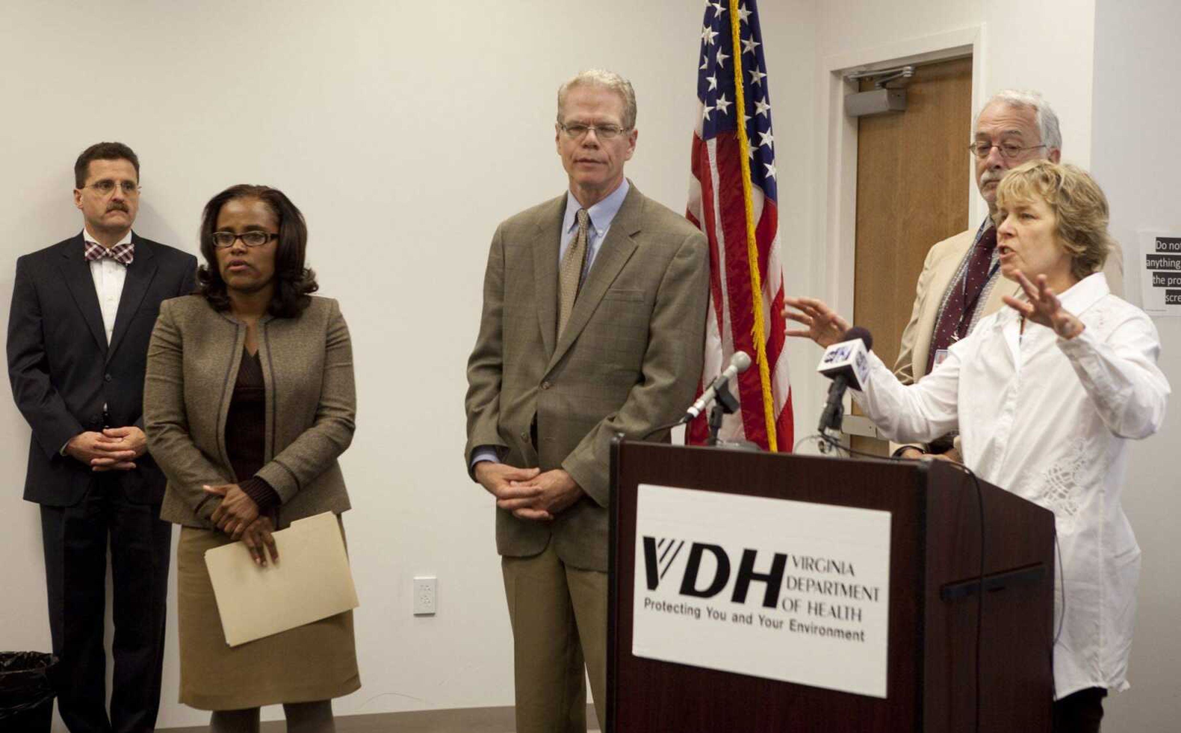 Dr. Molly O'Dell, right, health director of the New River Valley Health District, addresses a press conference on Friday, Oct. 5, 2012 in Roanoke, Va., concerning the recent fungal menigitis outbreak investigation tied to tainted injections. Other health care officials participating are, from the left; LewisGale Regional Health System CEO Victor Giovanetti, Director of the Roanoke-Alleghany Health Department Dr. Stephanie Harper, Chief Medical Officer for LewisGale Regional Health System Dr. Gary Winfield, Dr. Thomas Kerkering, Infectious Disease, Carilion Clinic. Public health officials in Virginia say the number of suspected cases of a rare and potentially deadly outbreak of meningitis has increased to five. The state has recorded one death linked to a fungal meningitis outbreak.(AP Photo/The Roanoke Times, Stephanie Klein-Davis) LOCAL TV OUT; SALEM TIMES REGISTER OUT; FINCASTLE HERALD OUT; CHRISTIANBURG NEWS MESSENGER OUT; RADFORD NEWS JOURNAL OUT; ROANOKE STAR SENTINEL OUT