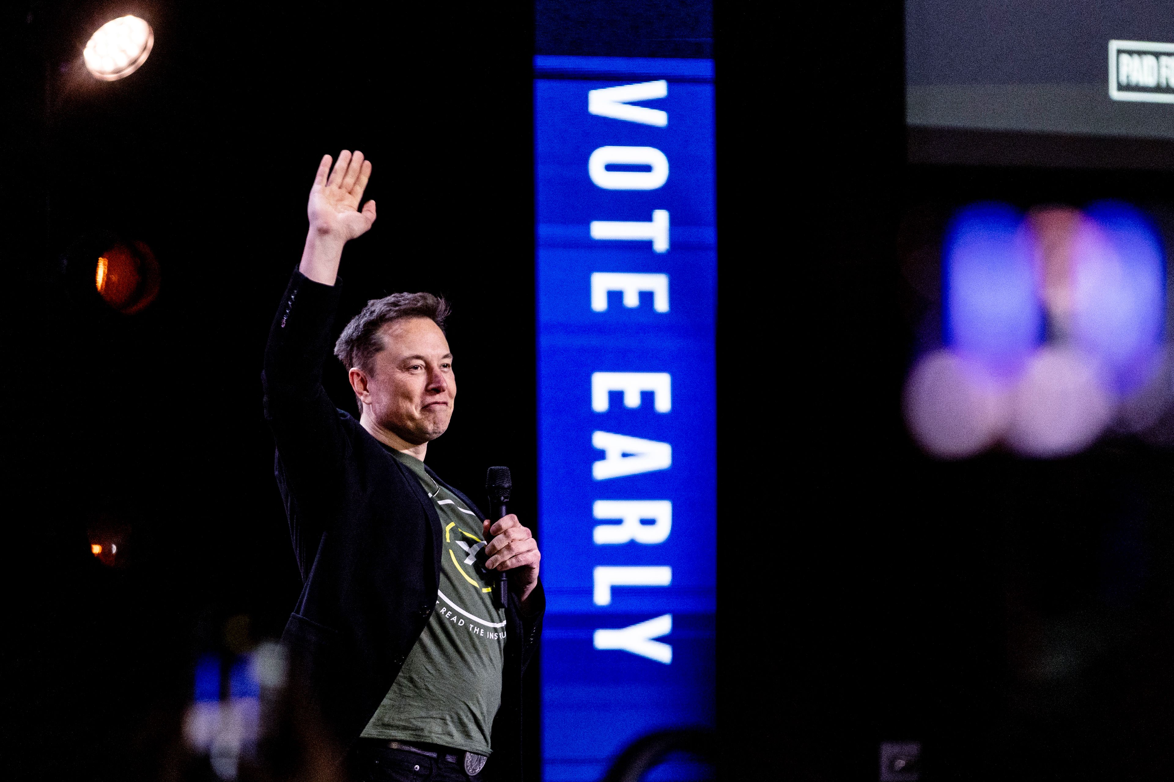 Elon Musk gestures as he speaks at Life Center Church in Harrisburg, Pa., Saturday, Oct. 19, 2024. (Sean Simmers/The Patriot-News via AP)