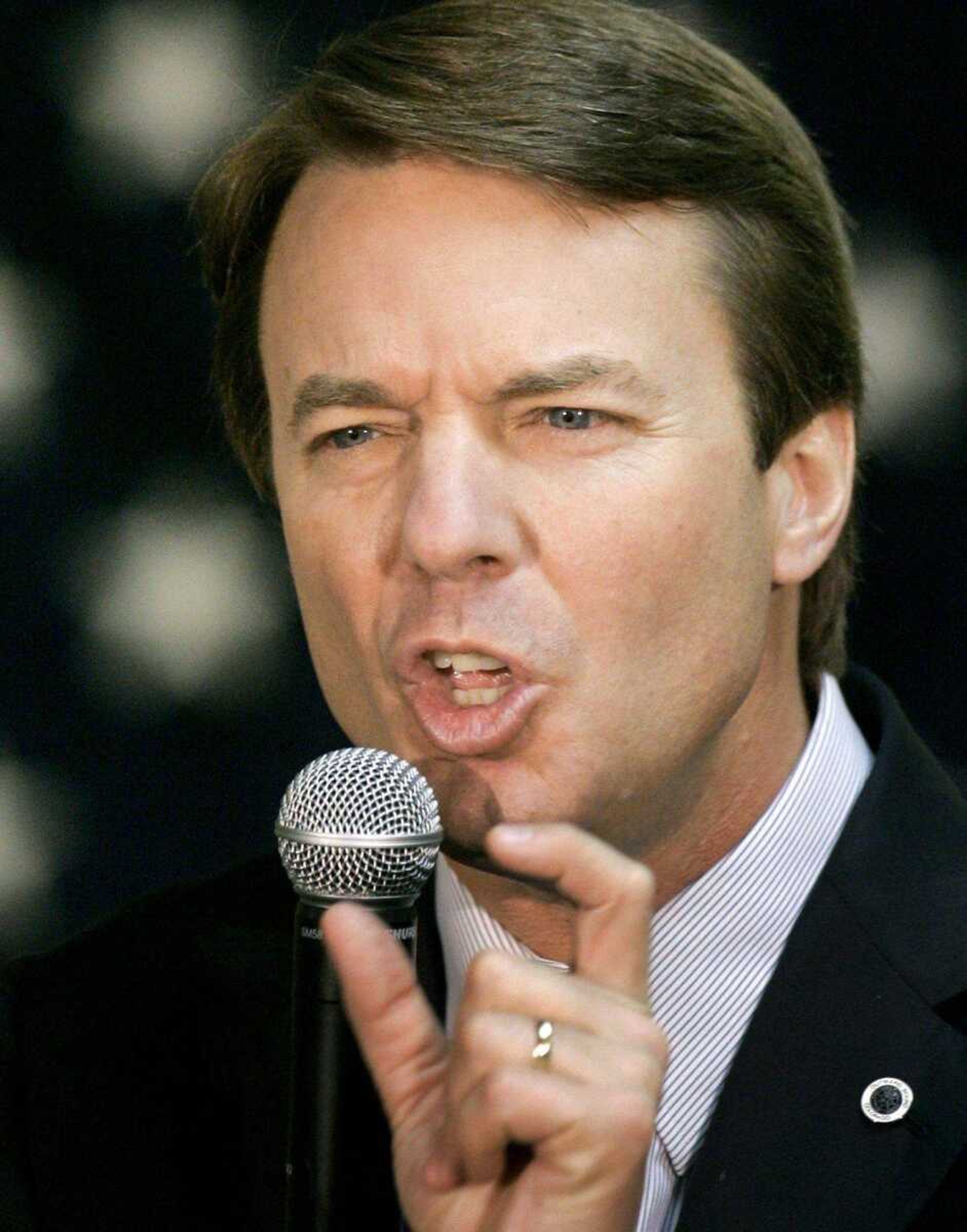 Democratic presidential hopeful former Sen. John Edwards, D-N.C., speaks during a campaign stop in Lakeport, N.H., Monday, Jan. 7, 2008. (AP Photo/Steven Senne)